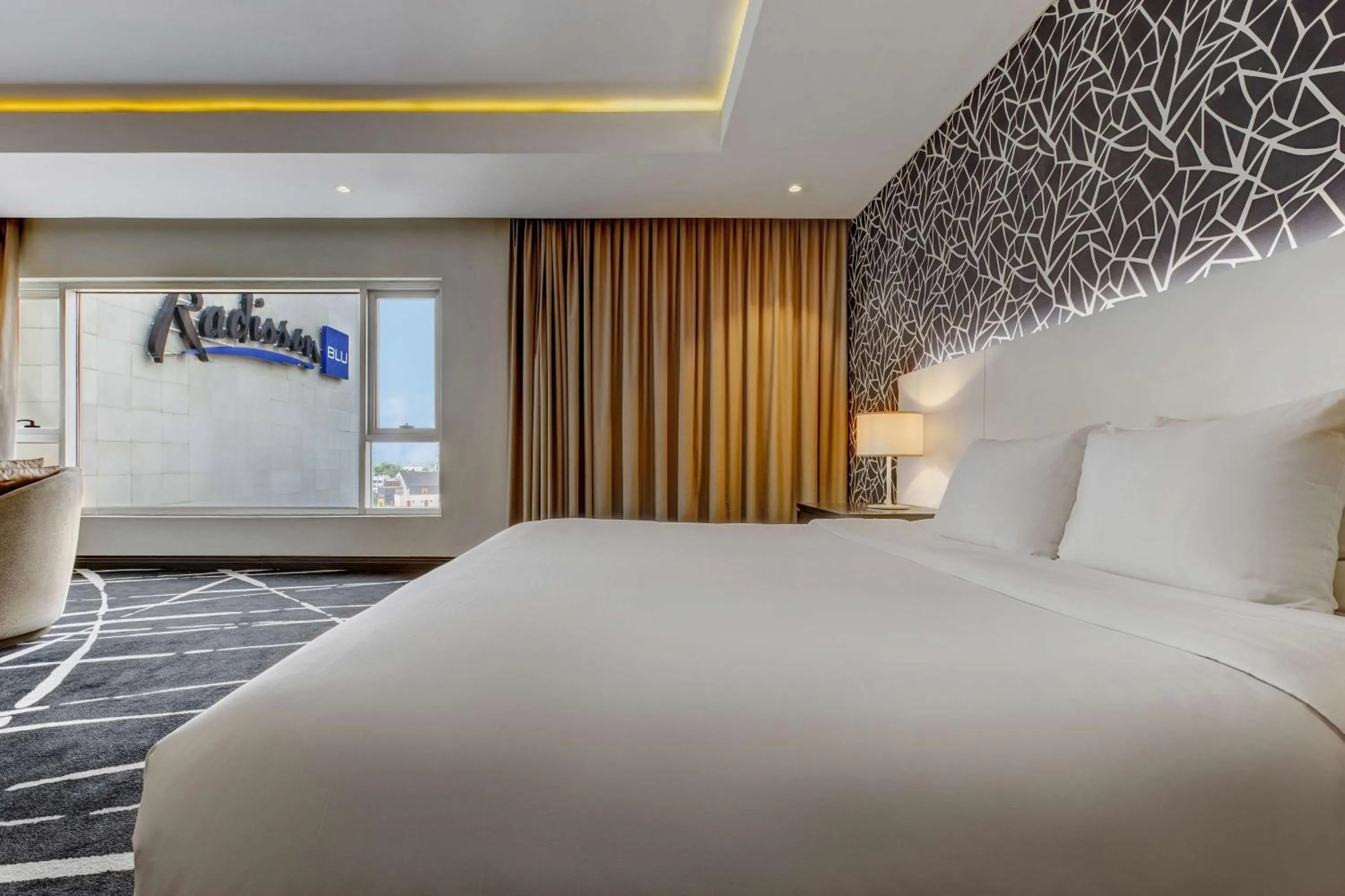 Photo of the whole room, Bed in Radisson Blu Lagos Ikeja