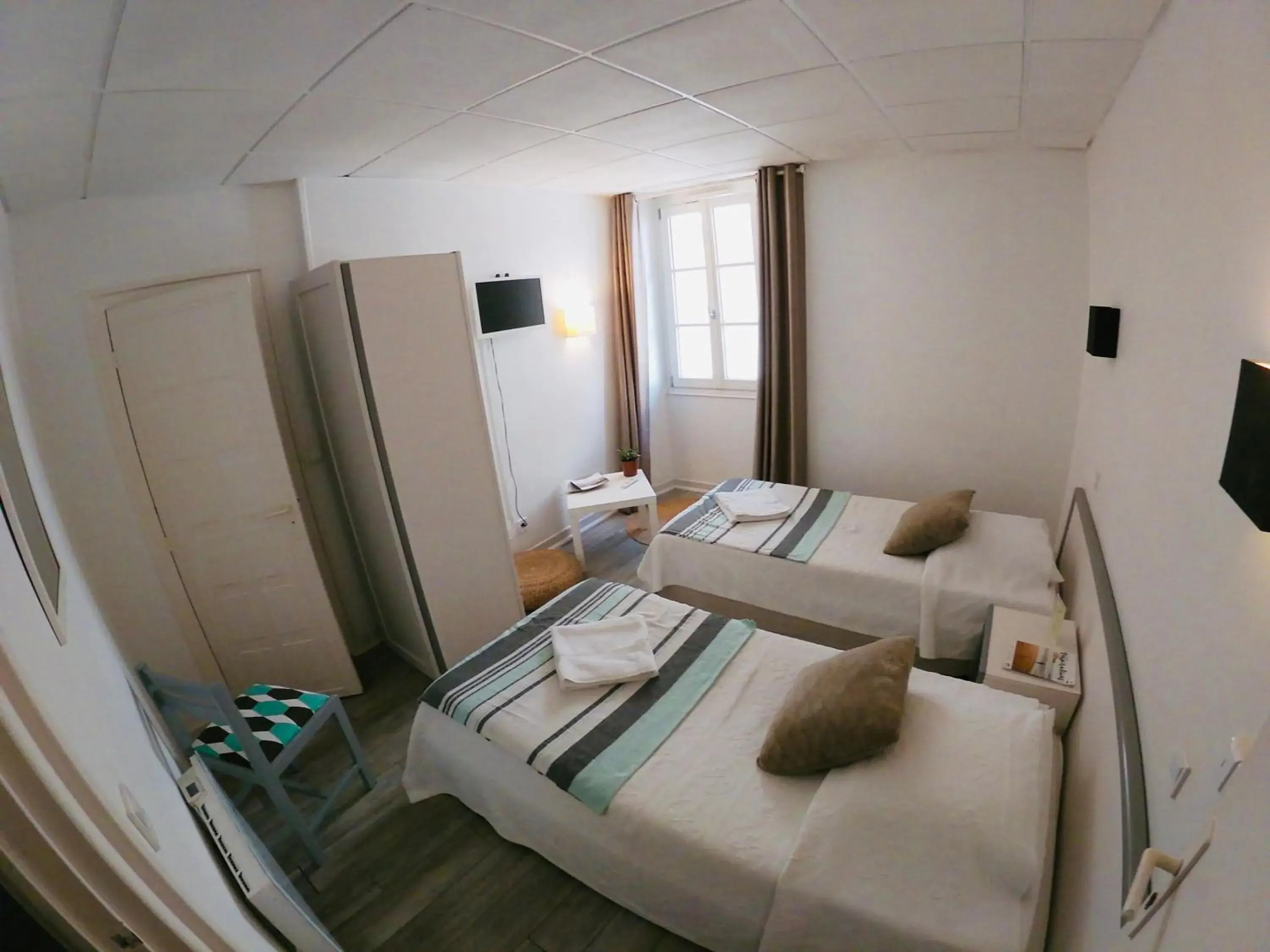 Twin Room in Le Petit Hôtel Twin Room in Le Petit Hôtel