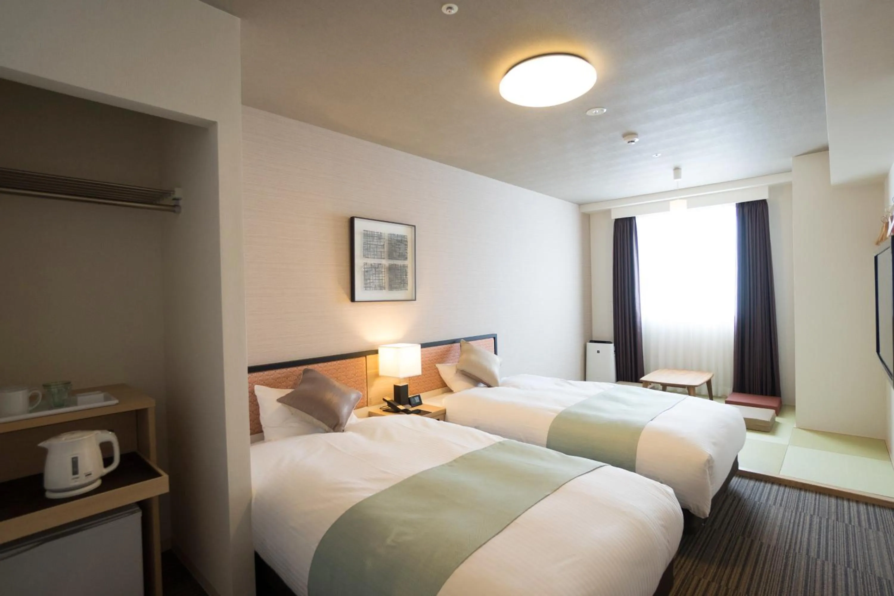 Photo of the whole room, Bed in Hotel La'gent Plaza Hakodate Hokuto