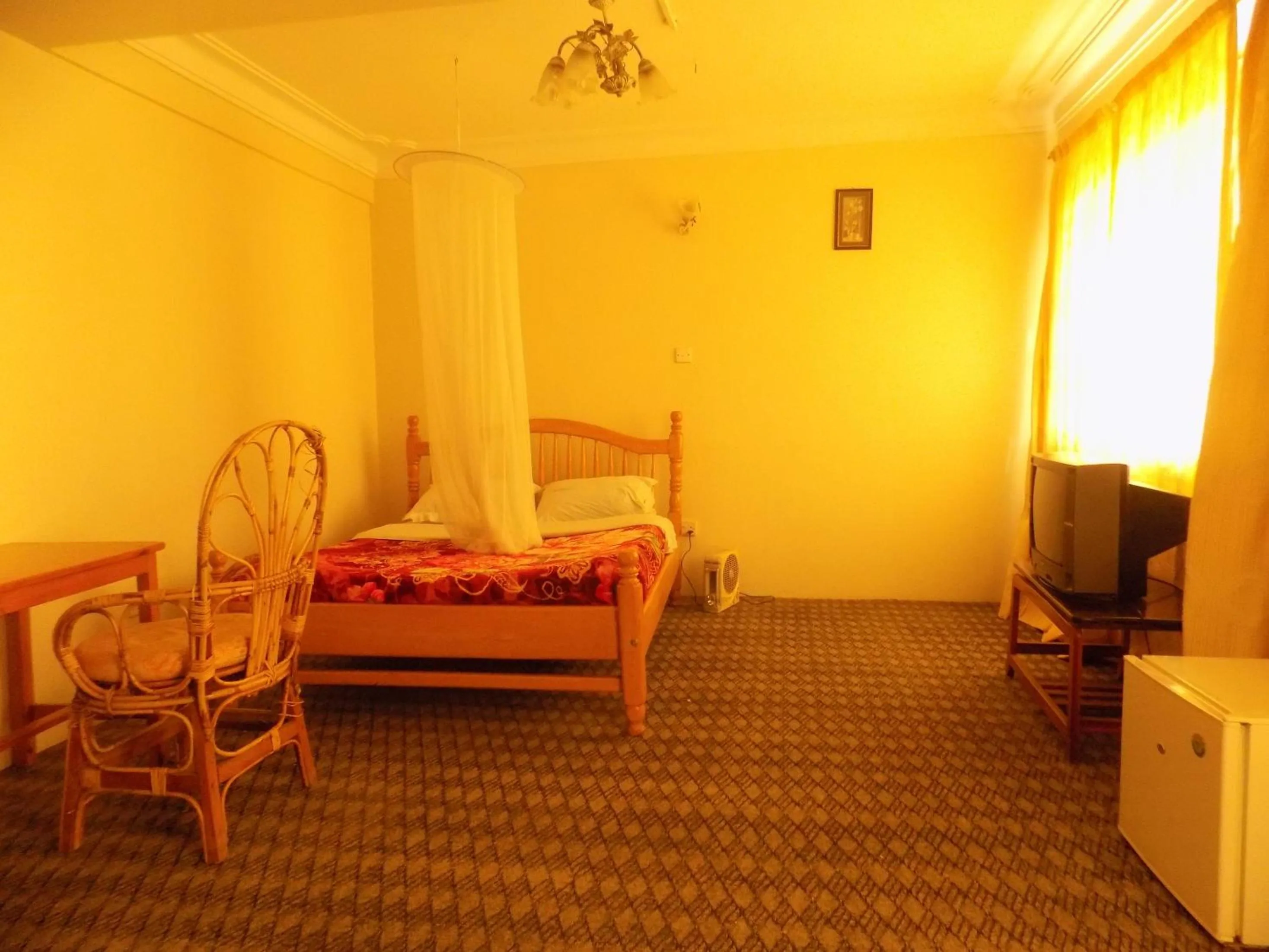 Bed in Meliva Guest House Mbarara