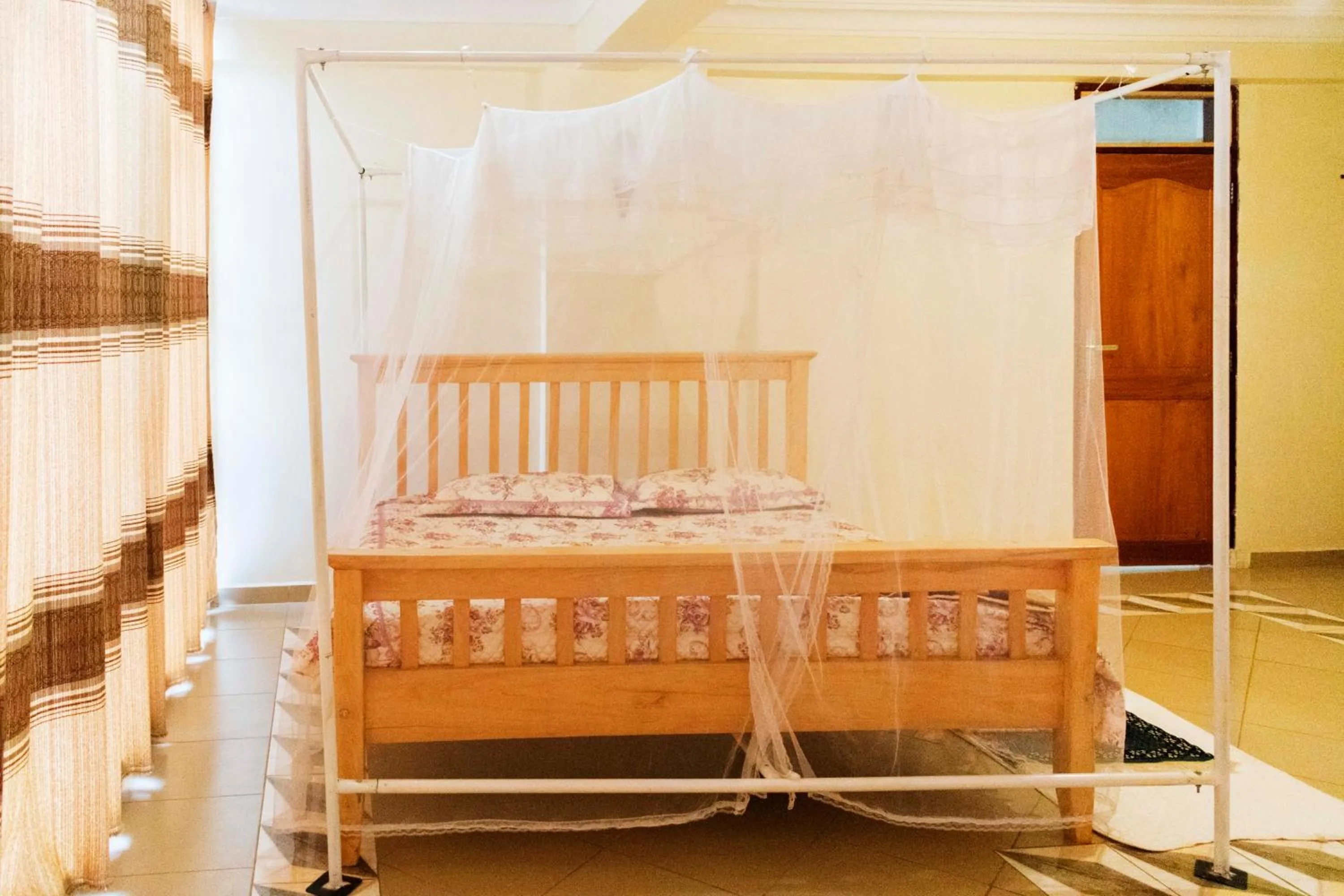 Bed in Meliva Guest House Mbarara