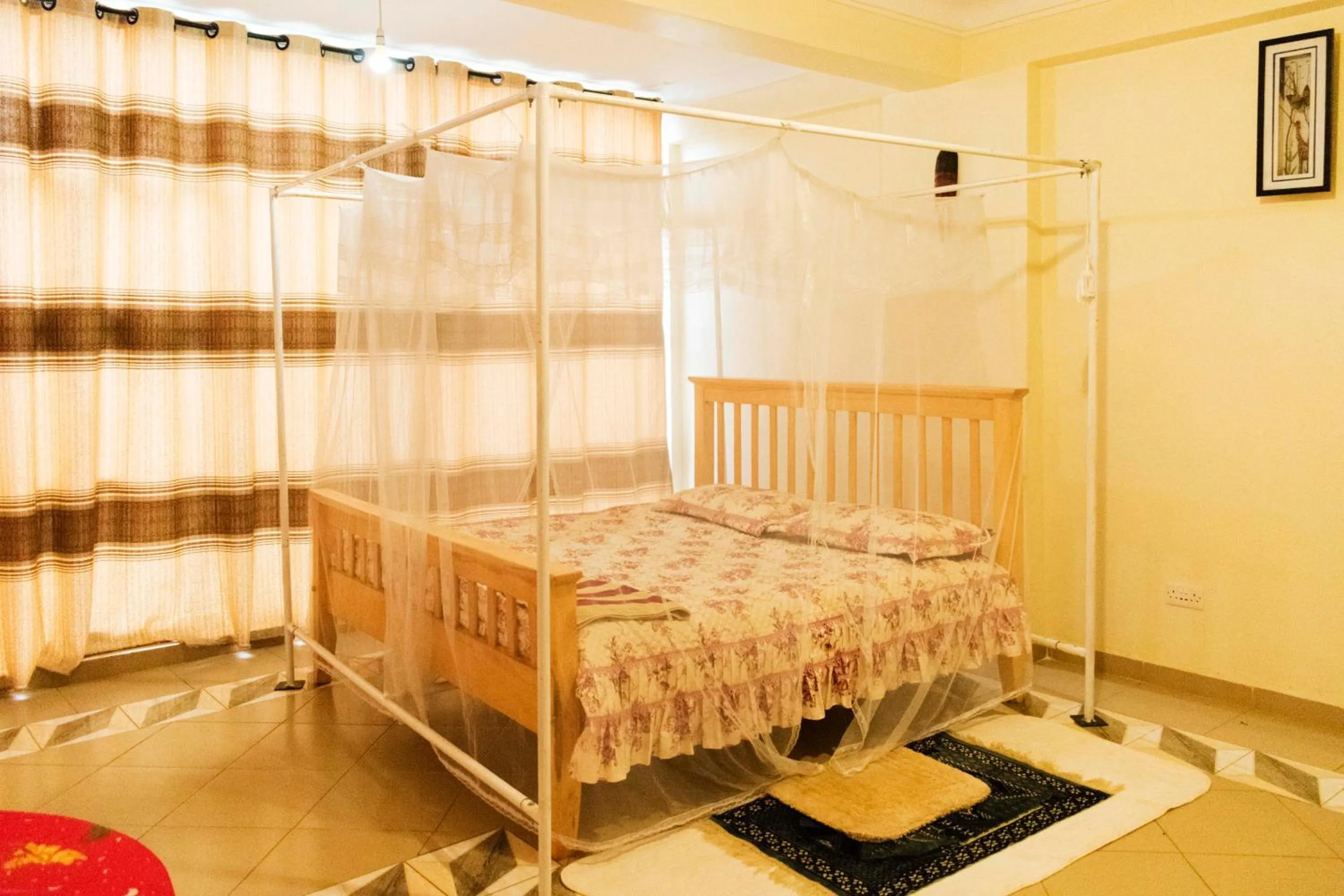 Bed in Meliva Guest House Mbarara