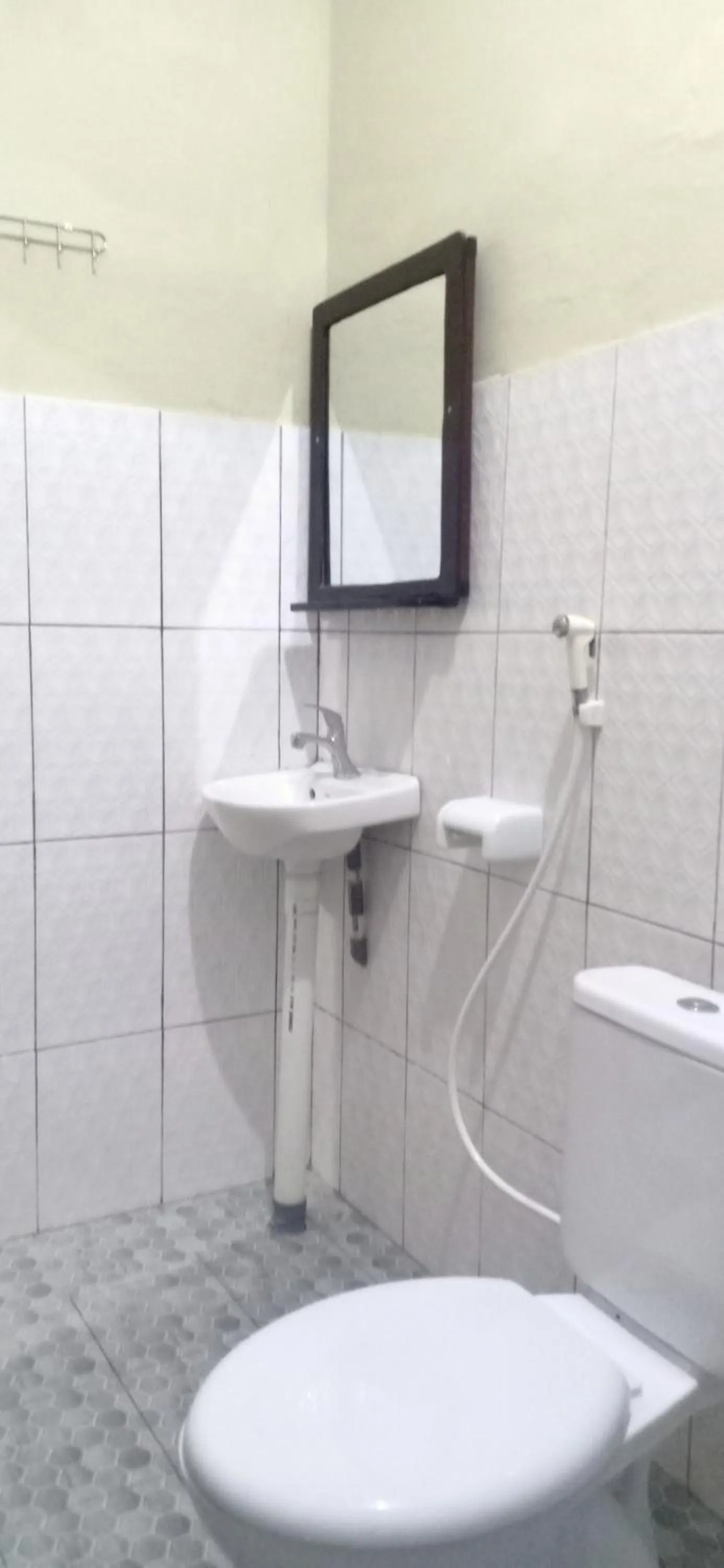 Bathroom in Dewi Garden Guesthouse