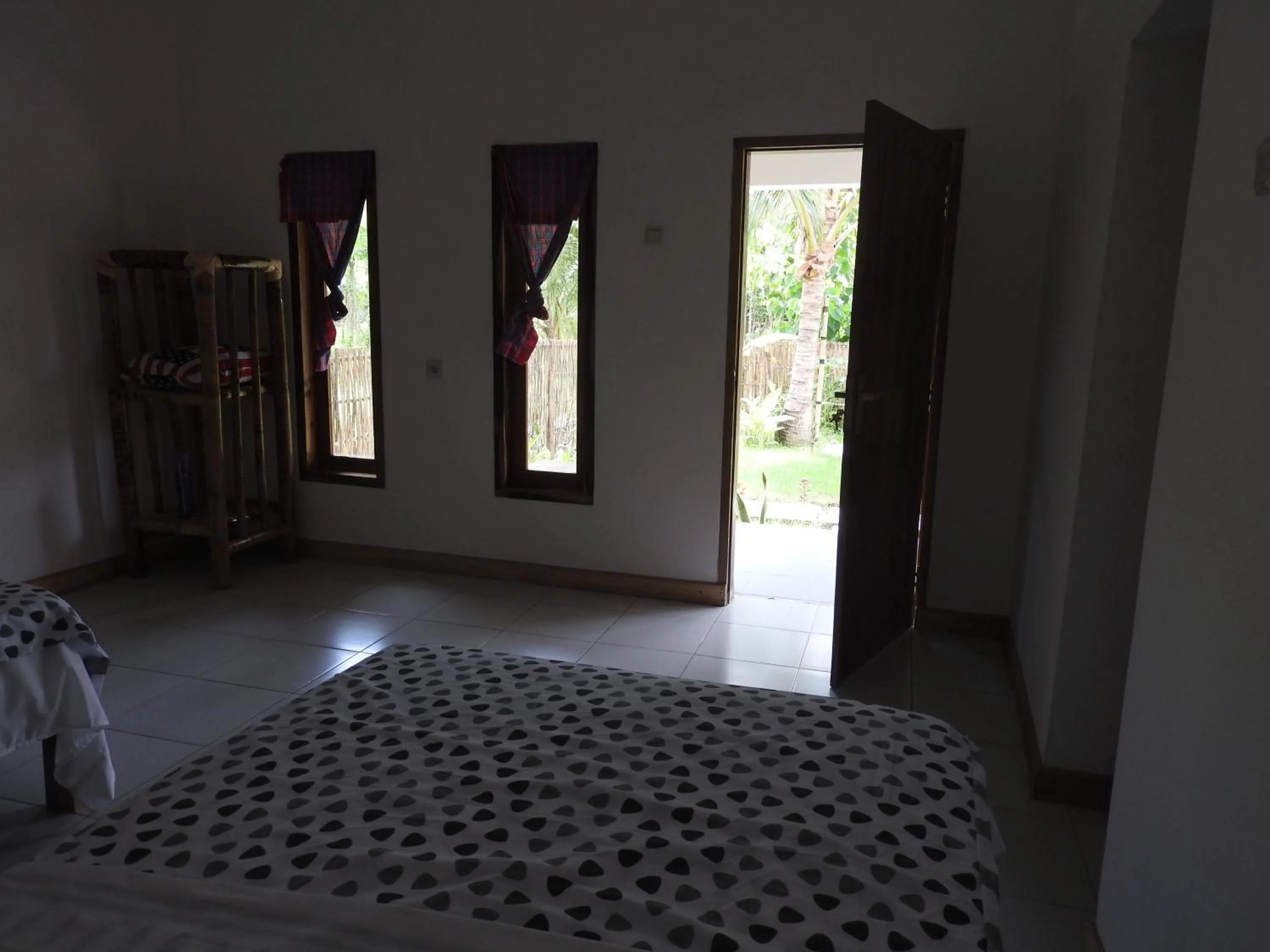 Bedroom in Dewi Garden Guesthouse