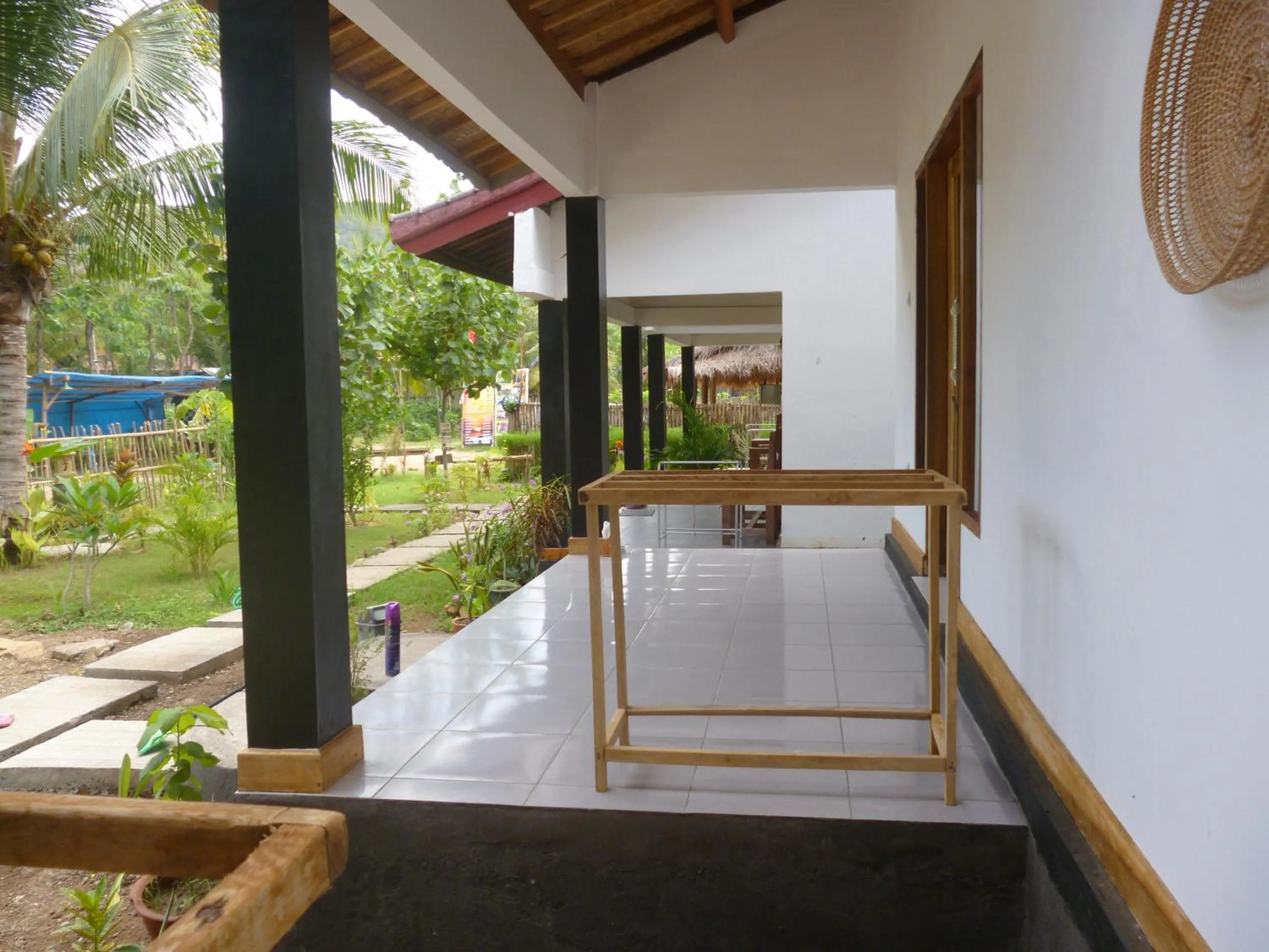 Balcony/Terrace in Dewi Garden Guesthouse