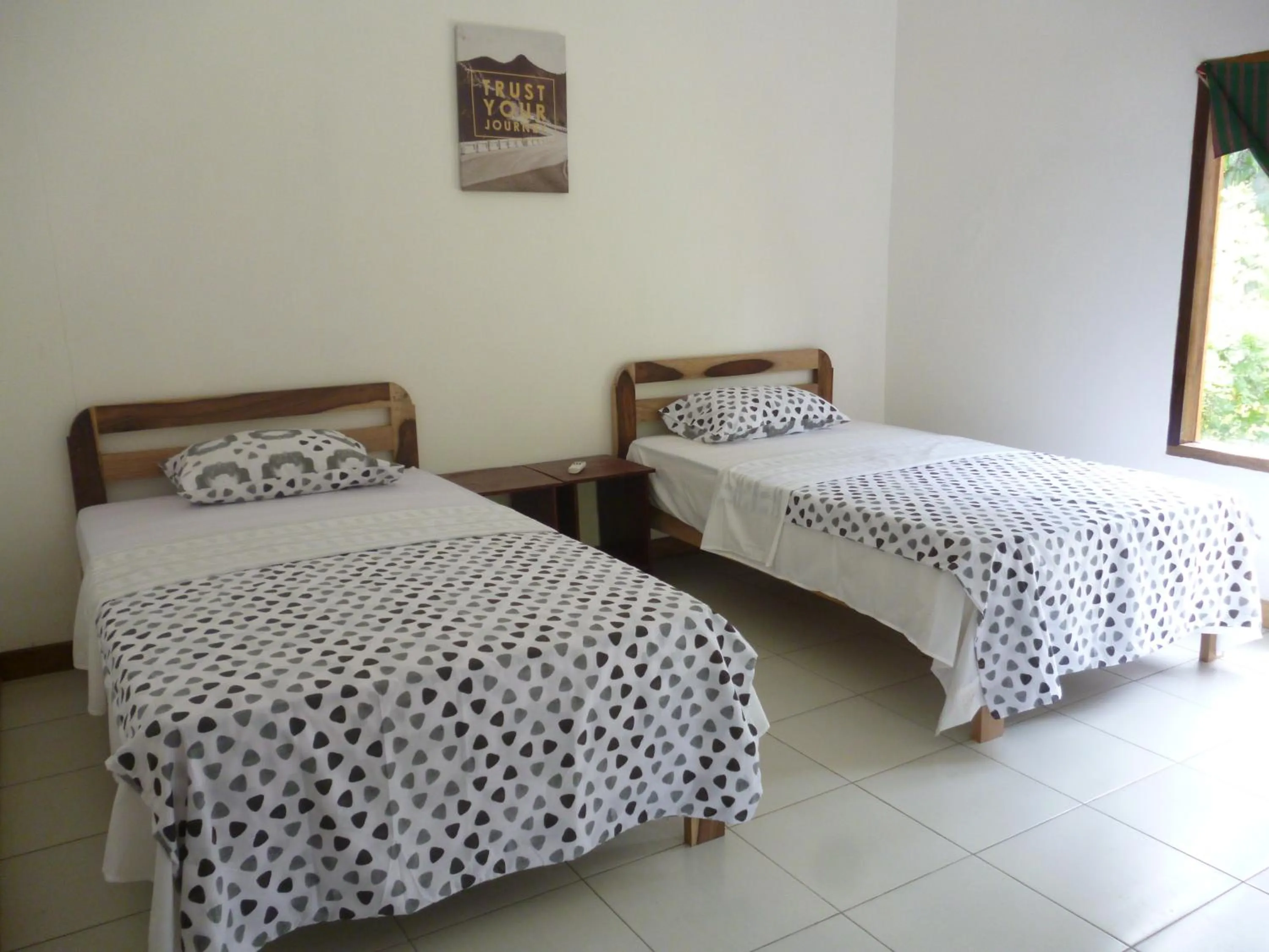 Bedroom in Dewi Garden Guesthouse