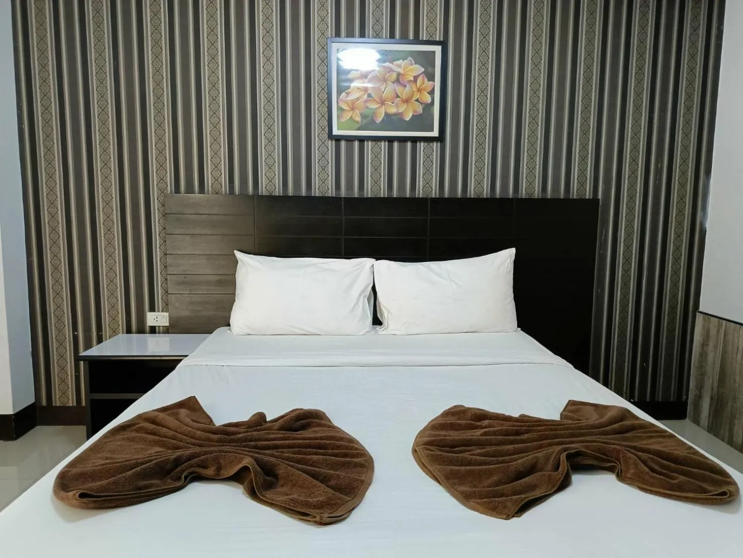 Bed in Grand Pruksa Siri Apartment