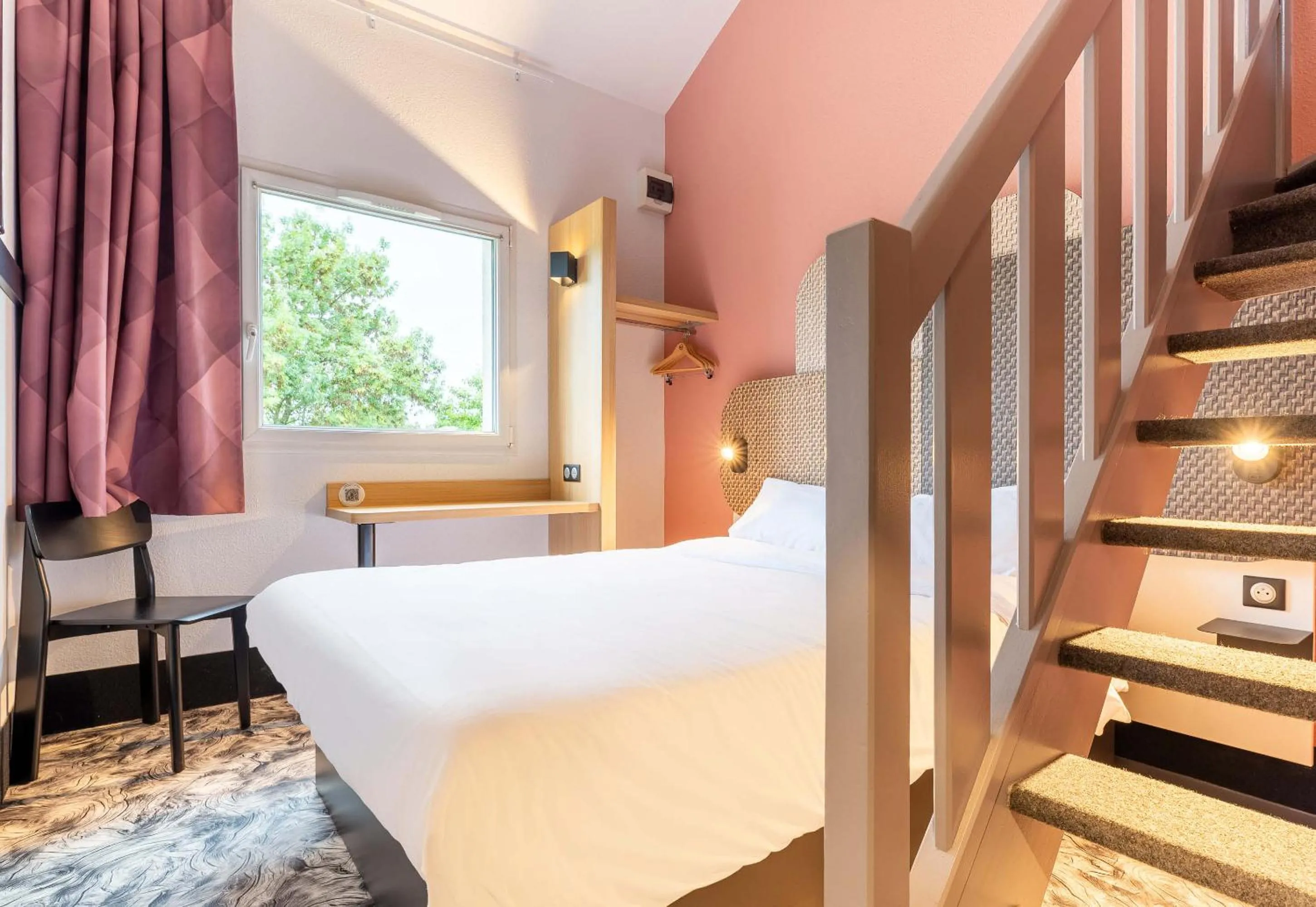 Bed in B&B HOTEL Nantes Atlantis Le Zenith