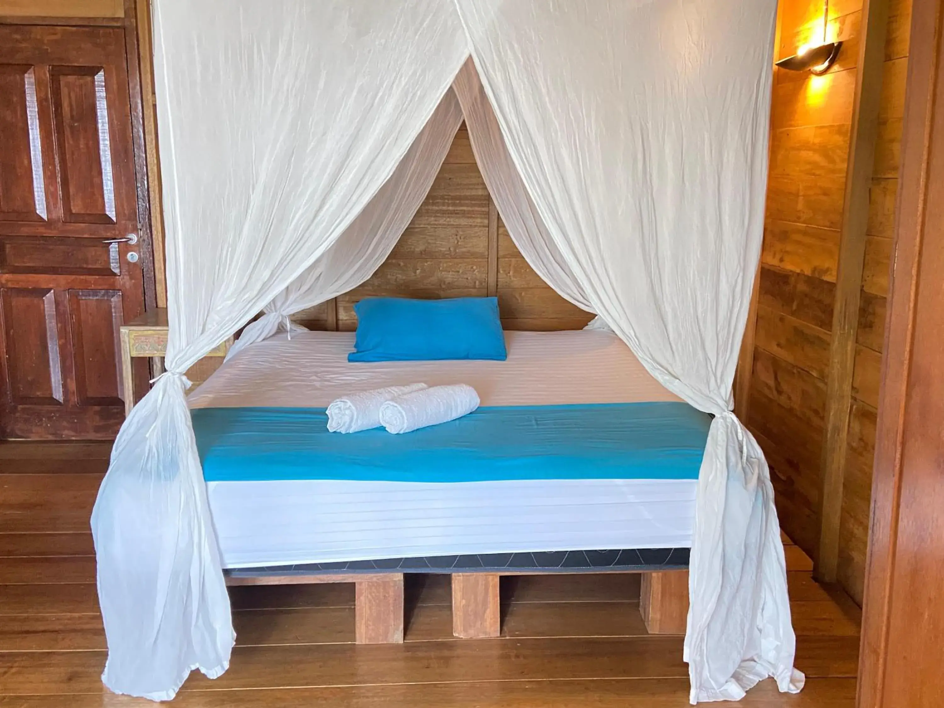 Bed in Casa Nemo Beach Resort & Spa Bed in Casa Nemo Beach Resort & Spa