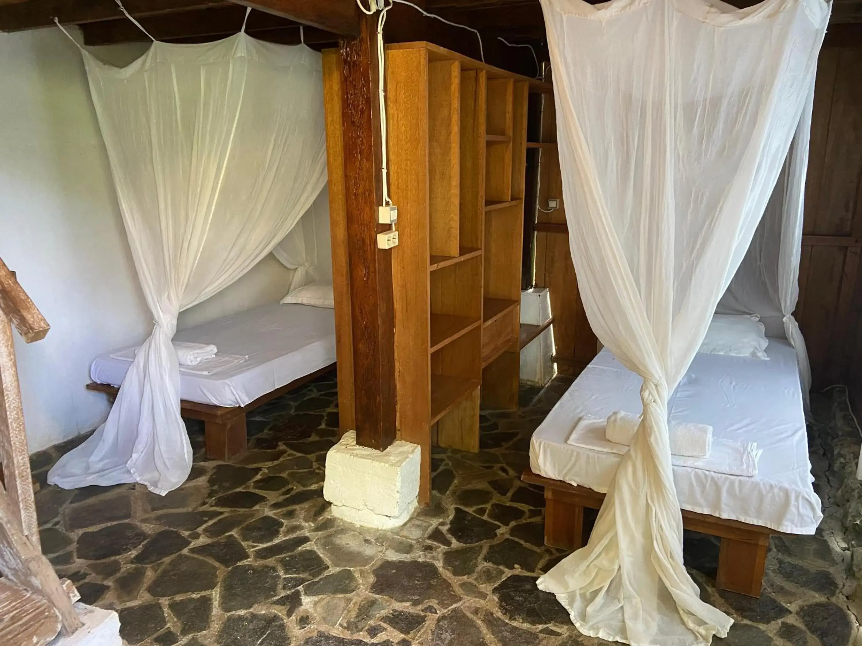 Bed in Casa Nemo Beach Resort & Spa Bed in Casa Nemo Beach Resort & Spa