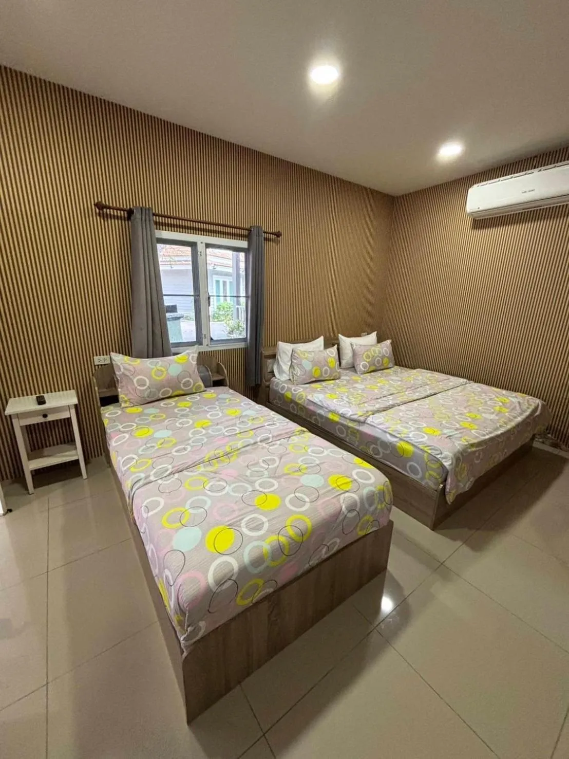 Bed in Baan Dara Resort