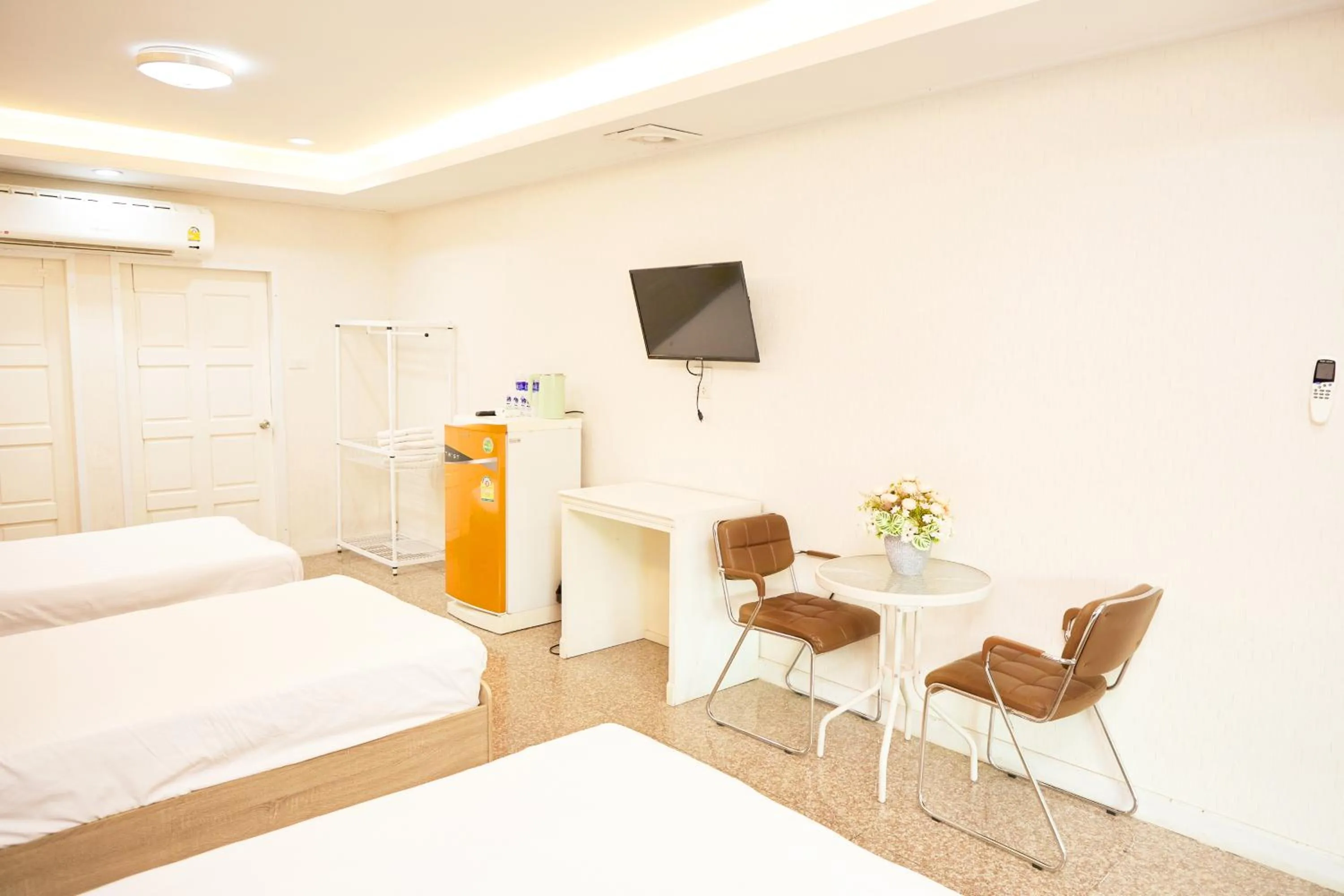 Bed in Baan Dara Resort