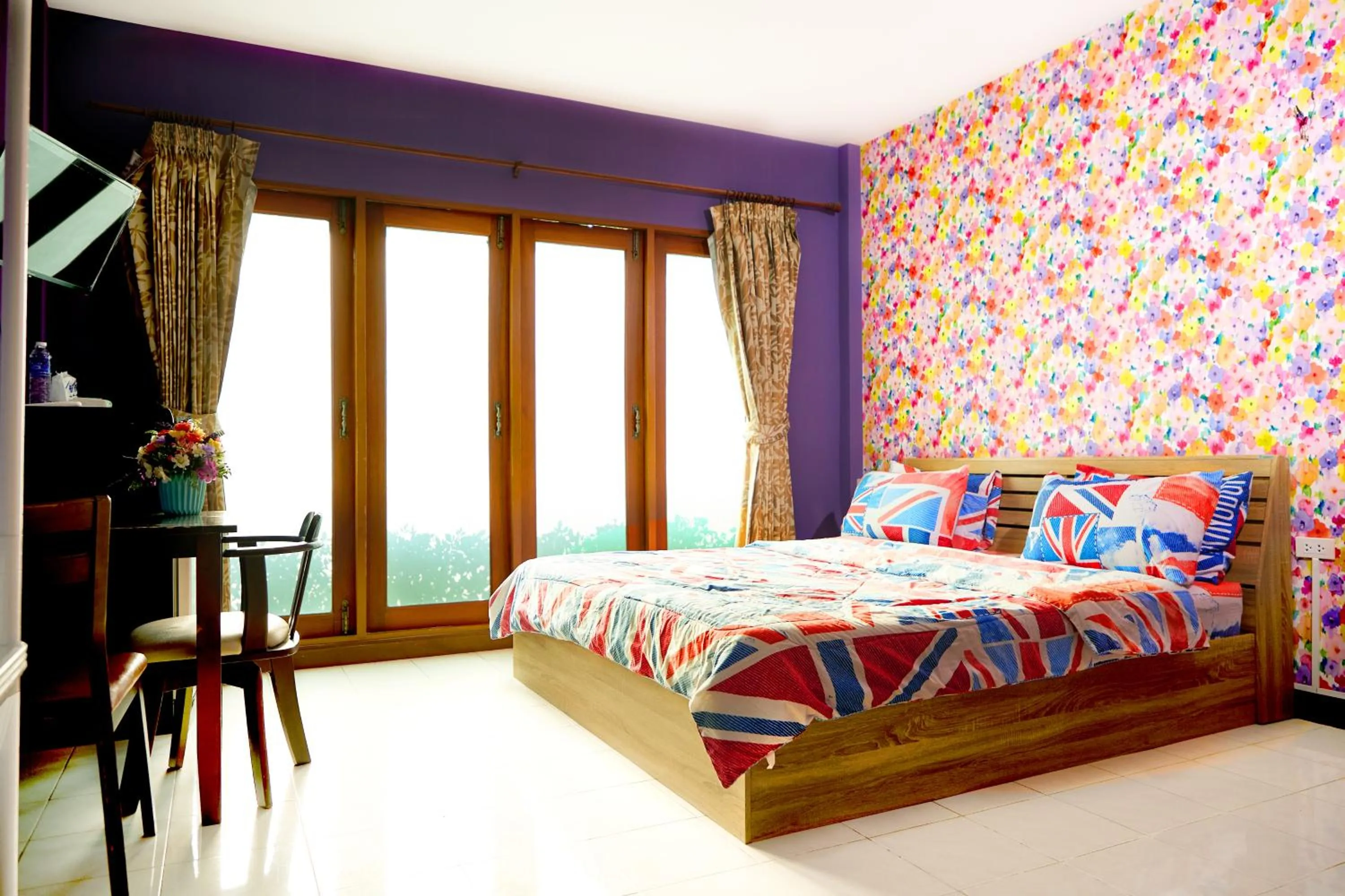 Bed in Baan Dara Resort