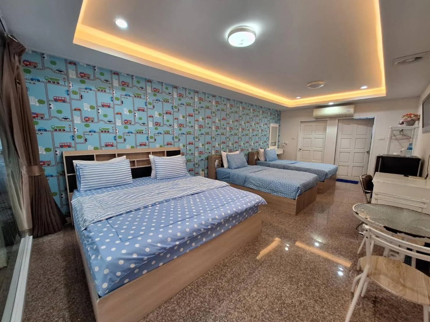 Bed in Baan Dara Resort