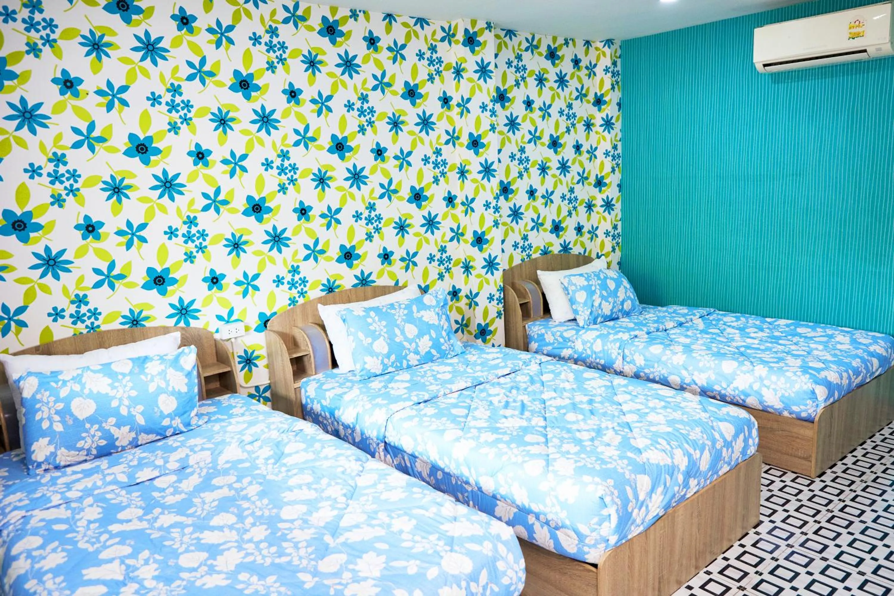 Bed in Baan Dara Resort