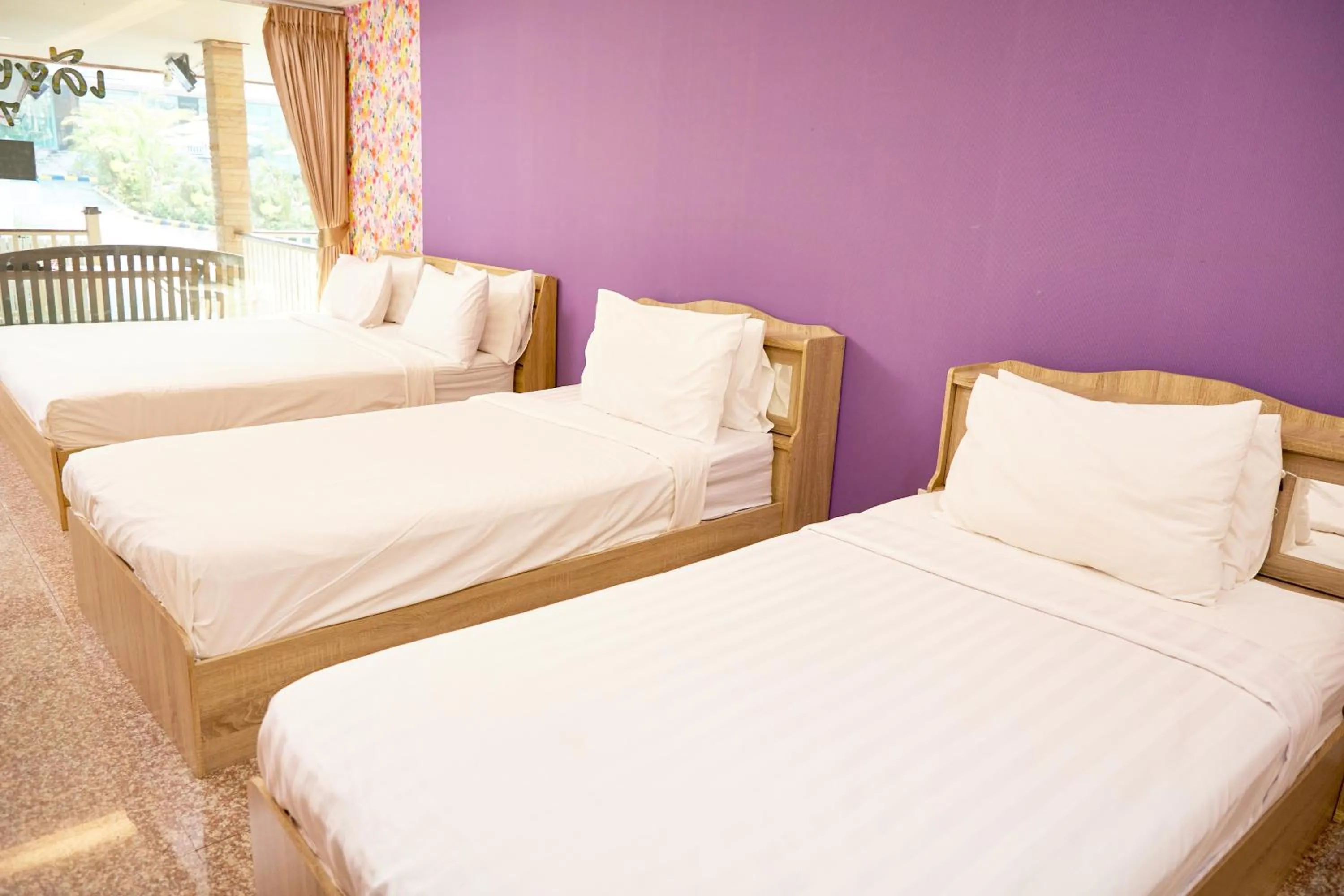 Bed in Baan Dara Resort