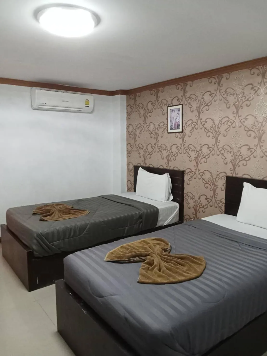 Bed in PS Hotel Saraburi
