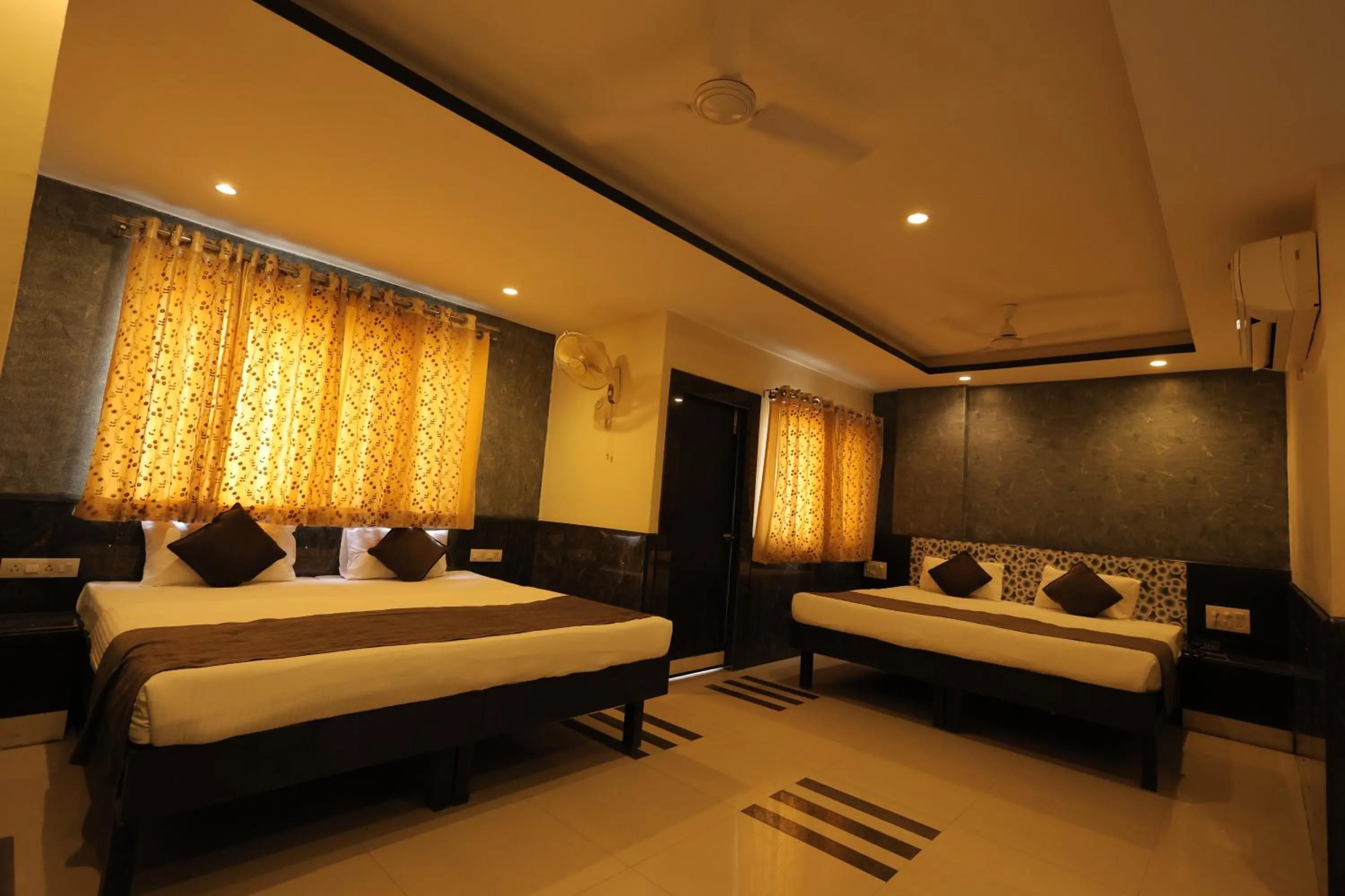 Bed in Nakshatra Hotel