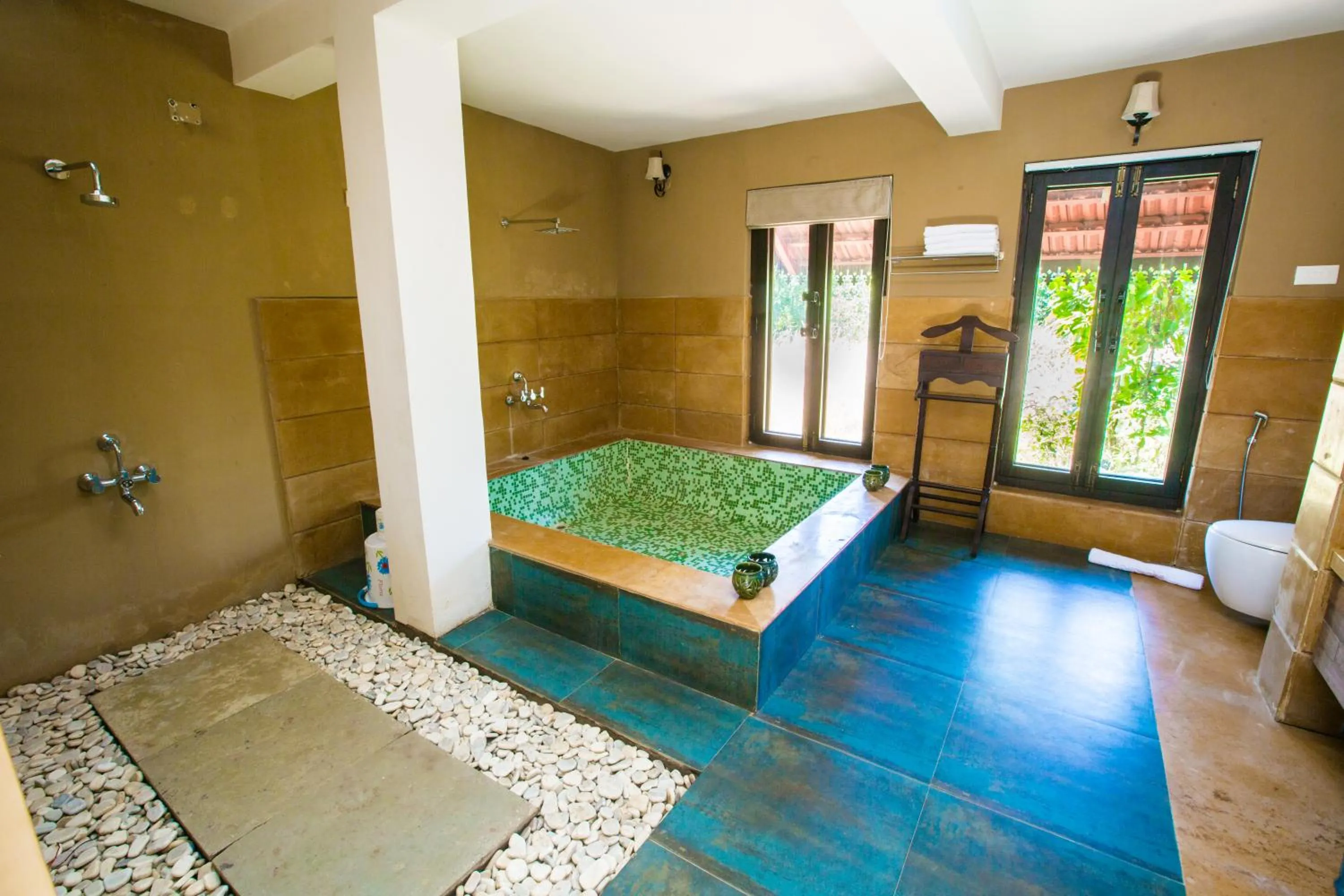 Bathroom, Bed in Vannraj Resort And Spa