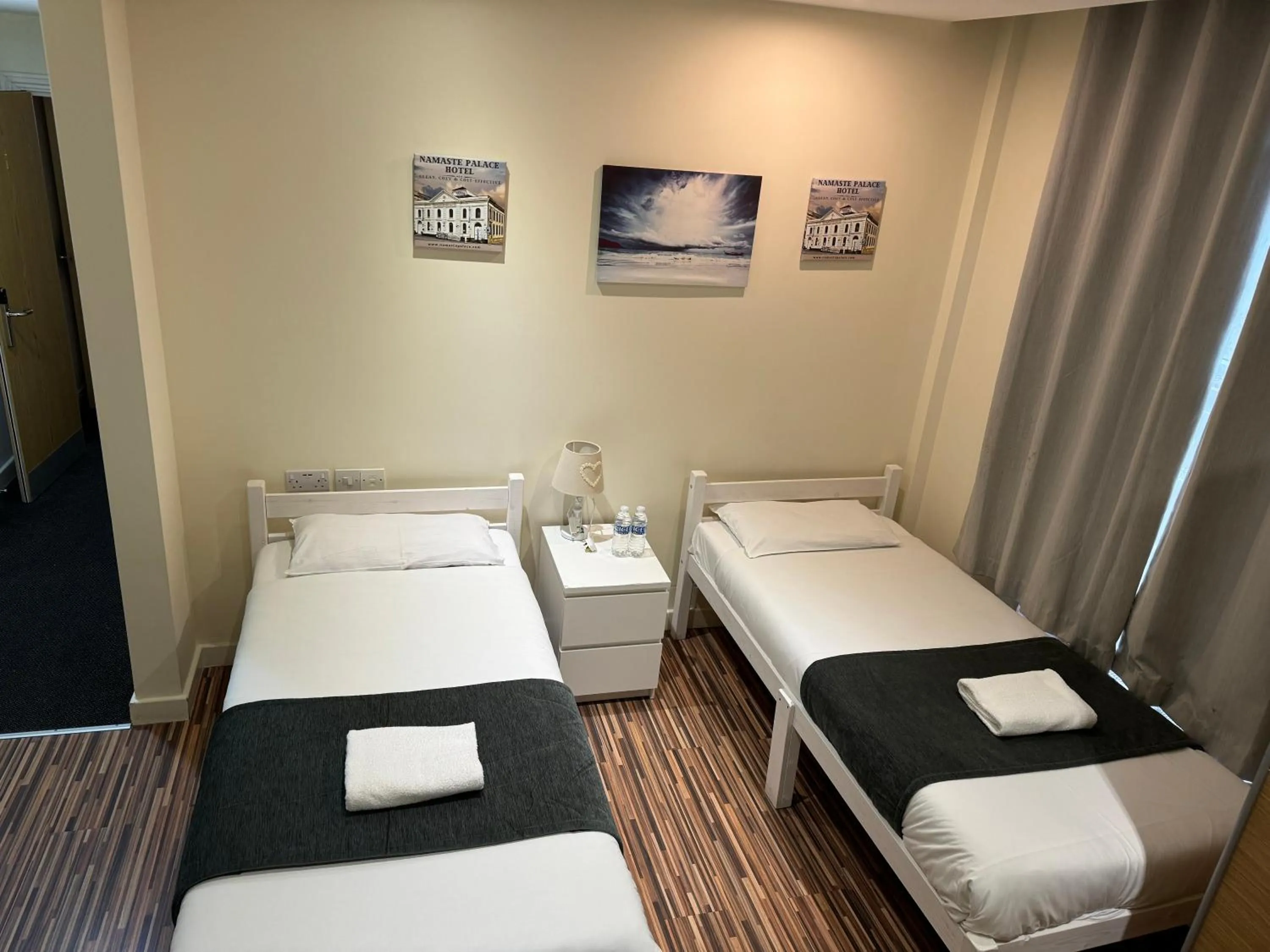 Bed in Namaste Palace Hotel