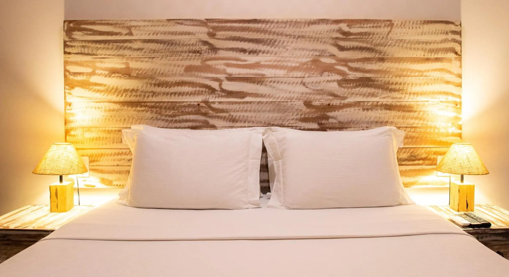 Bed in Pousada Tubarão