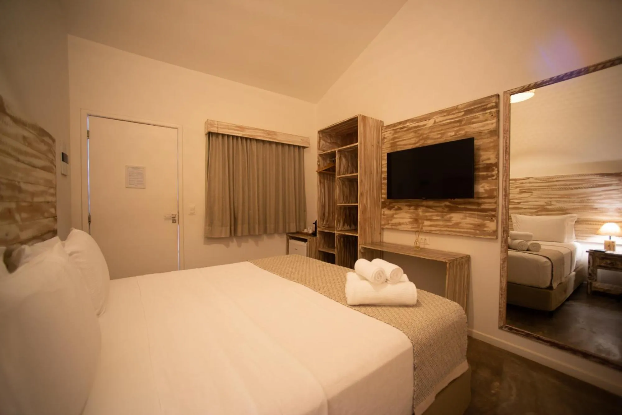 Bed in Pousada Tubarão