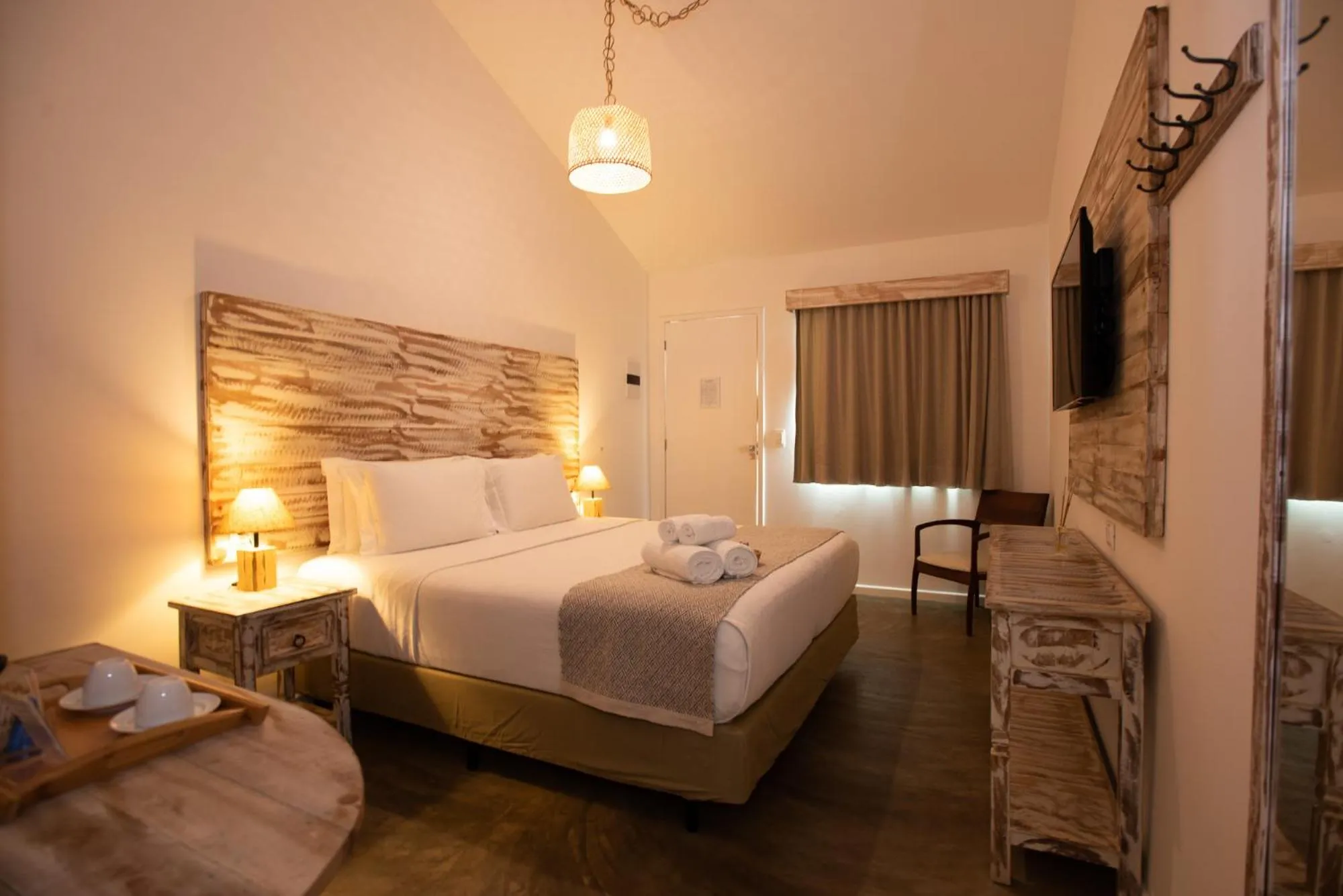 Bed in Pousada Tubarão