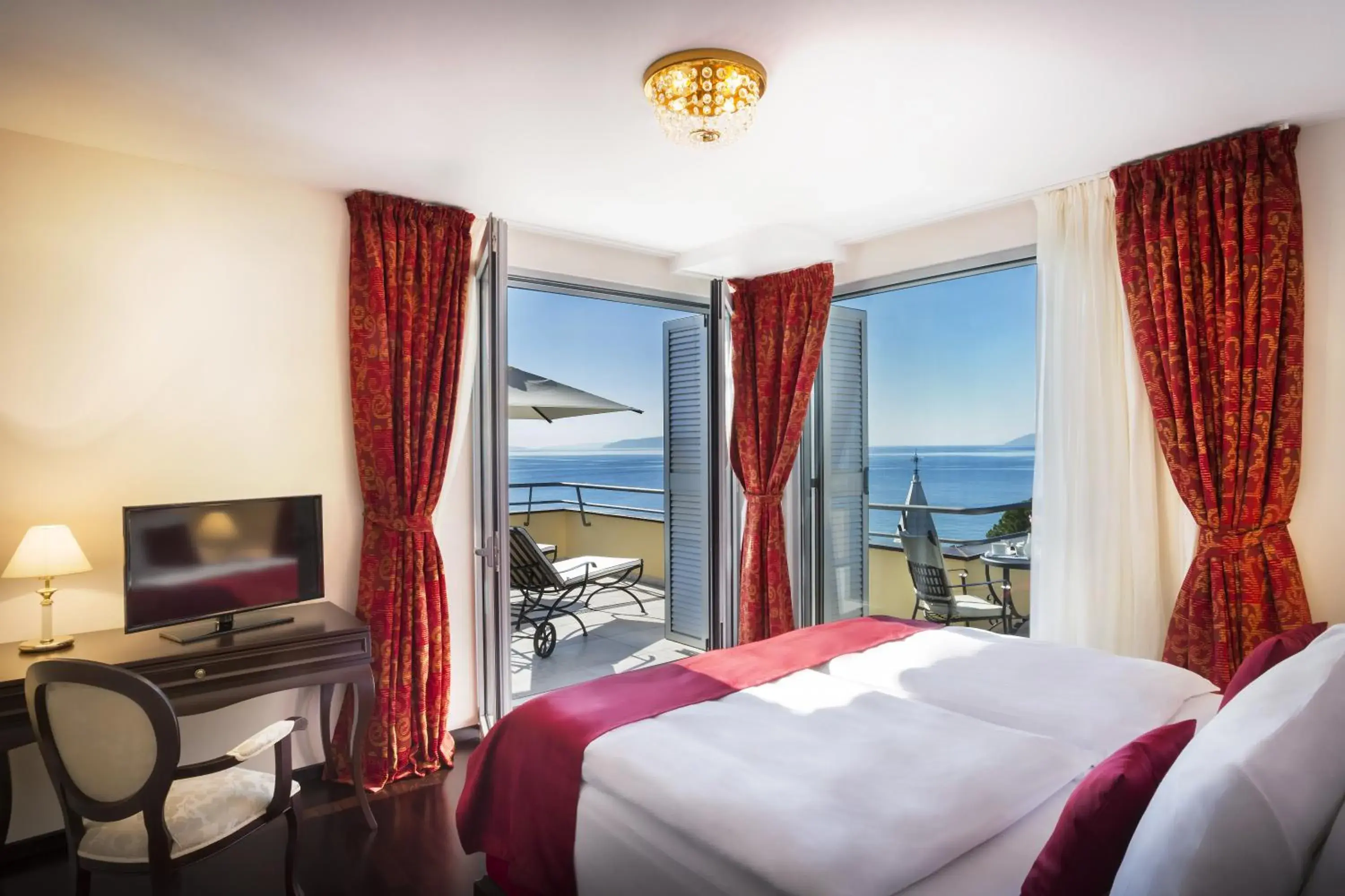 Photo of the whole room, Bed in Hotel Kvarner - by Liburnia Hotels & Villas Photo of the whole room, Bed in Hotel Kvarner - by Liburnia Hotels & Villas