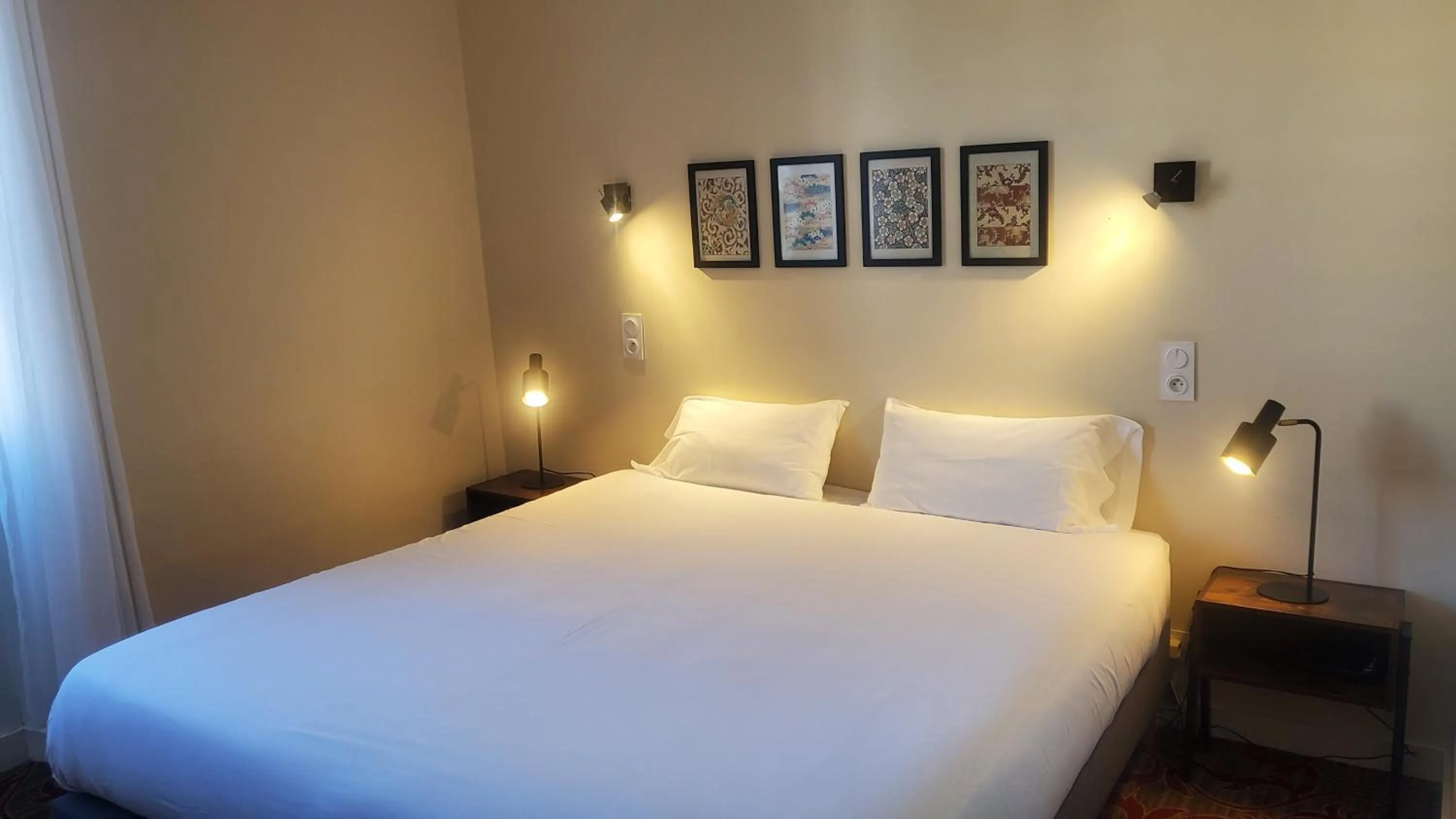 Bed in Grand Hôtel de la Poste