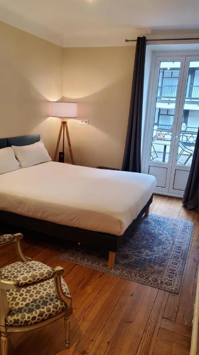 Bed in Grand Hôtel de la Poste