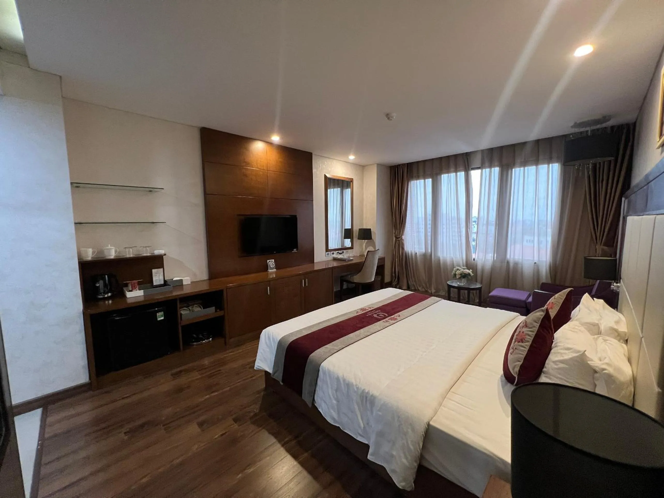 Bed in Le Indochina Hotel