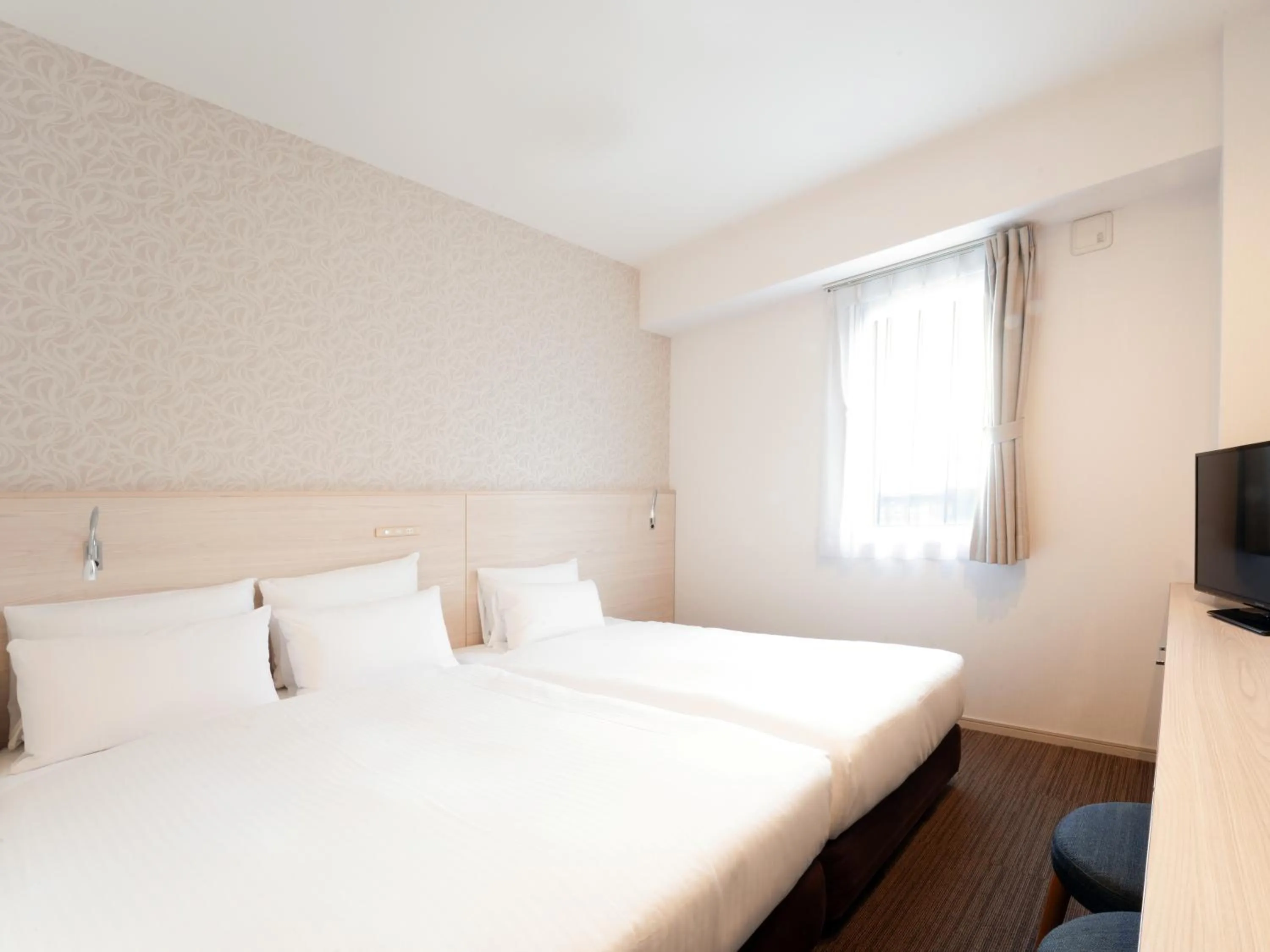 Photo of the whole room, Bed in The BREAKFAST HOTEL Fukuoka Tenjin