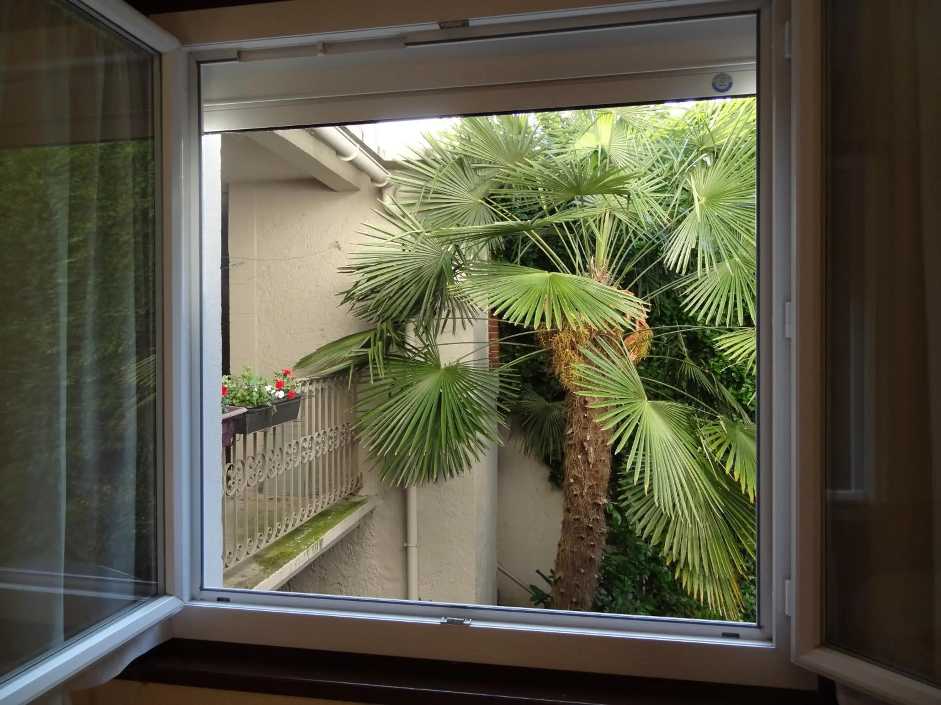 Garden view in Cit'Hotel de la Marne Garden view in Cit'Hotel de la Marne