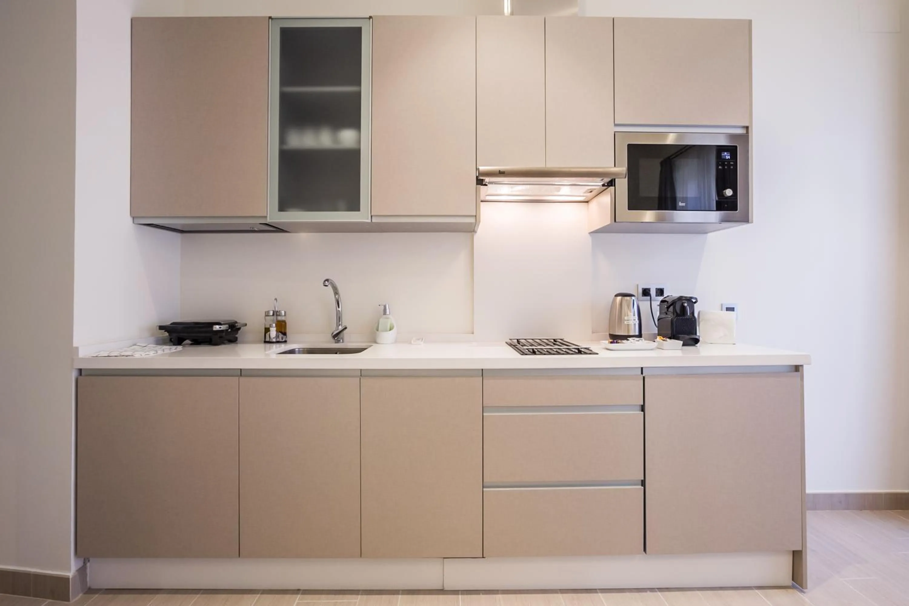 Kitchen or kitchenette in Welldone Cathedral Suites