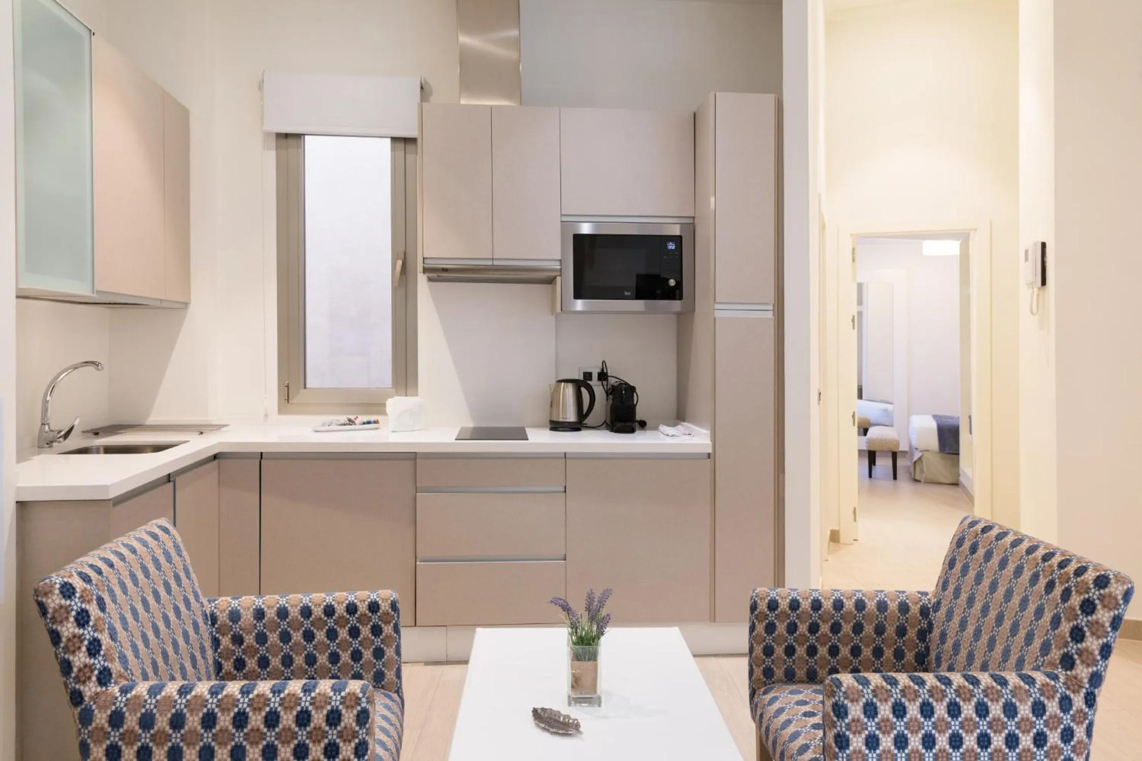 Kitchen or kitchenette in Welldone Cathedral Suites