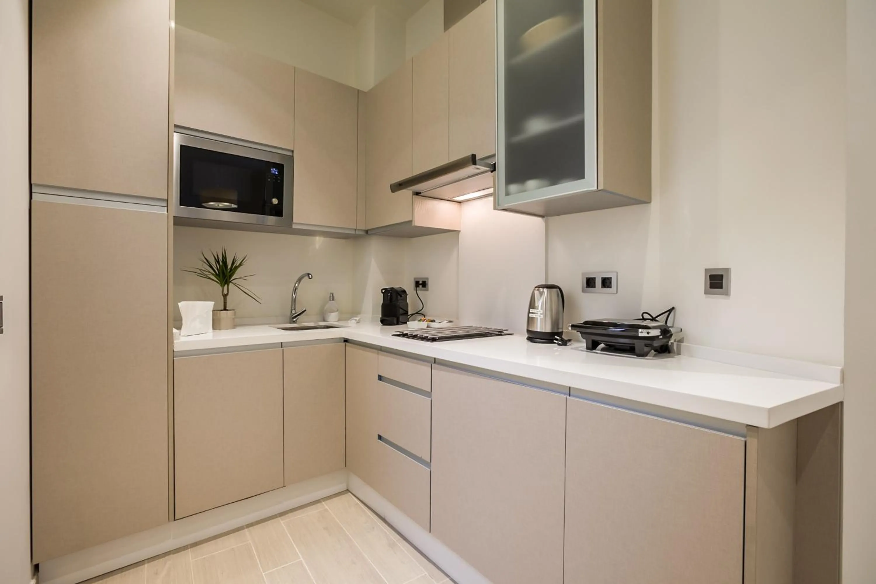 Kitchen or kitchenette in Welldone Cathedral Suites