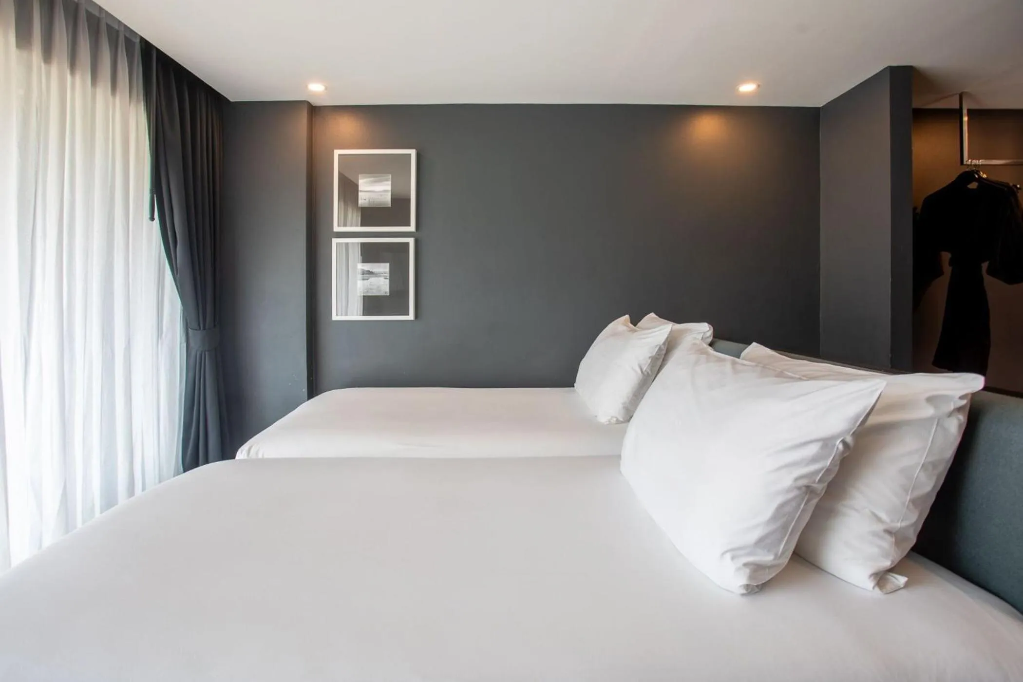 Bed in Hotel Tide Phuket Beachfront