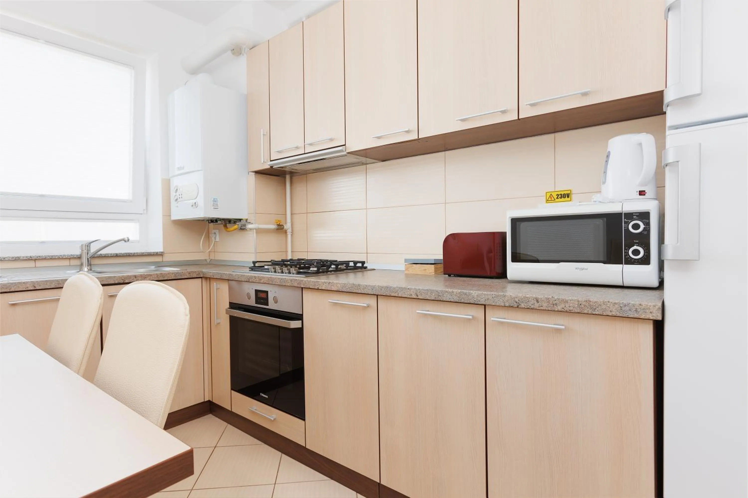 Kitchen or kitchenette in Brasov Holiday Apartments