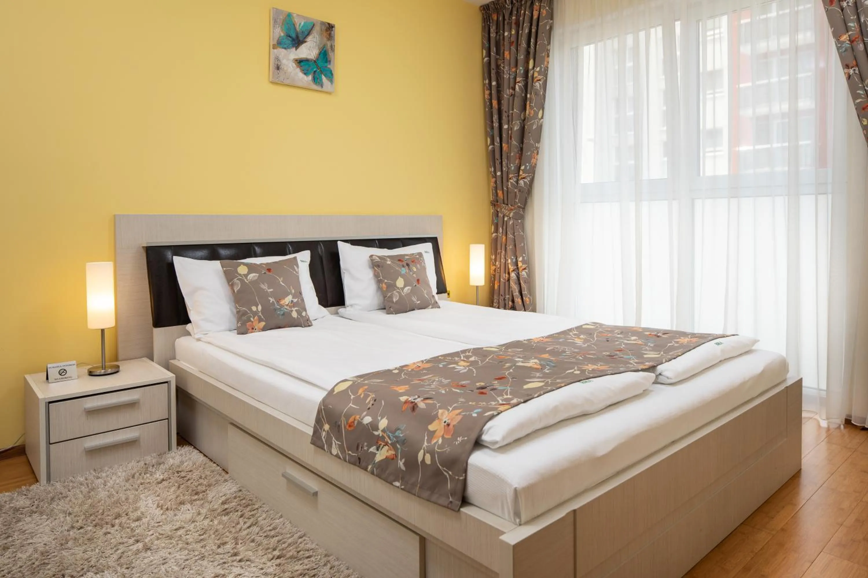 Bed in Brasov Holiday Apartments