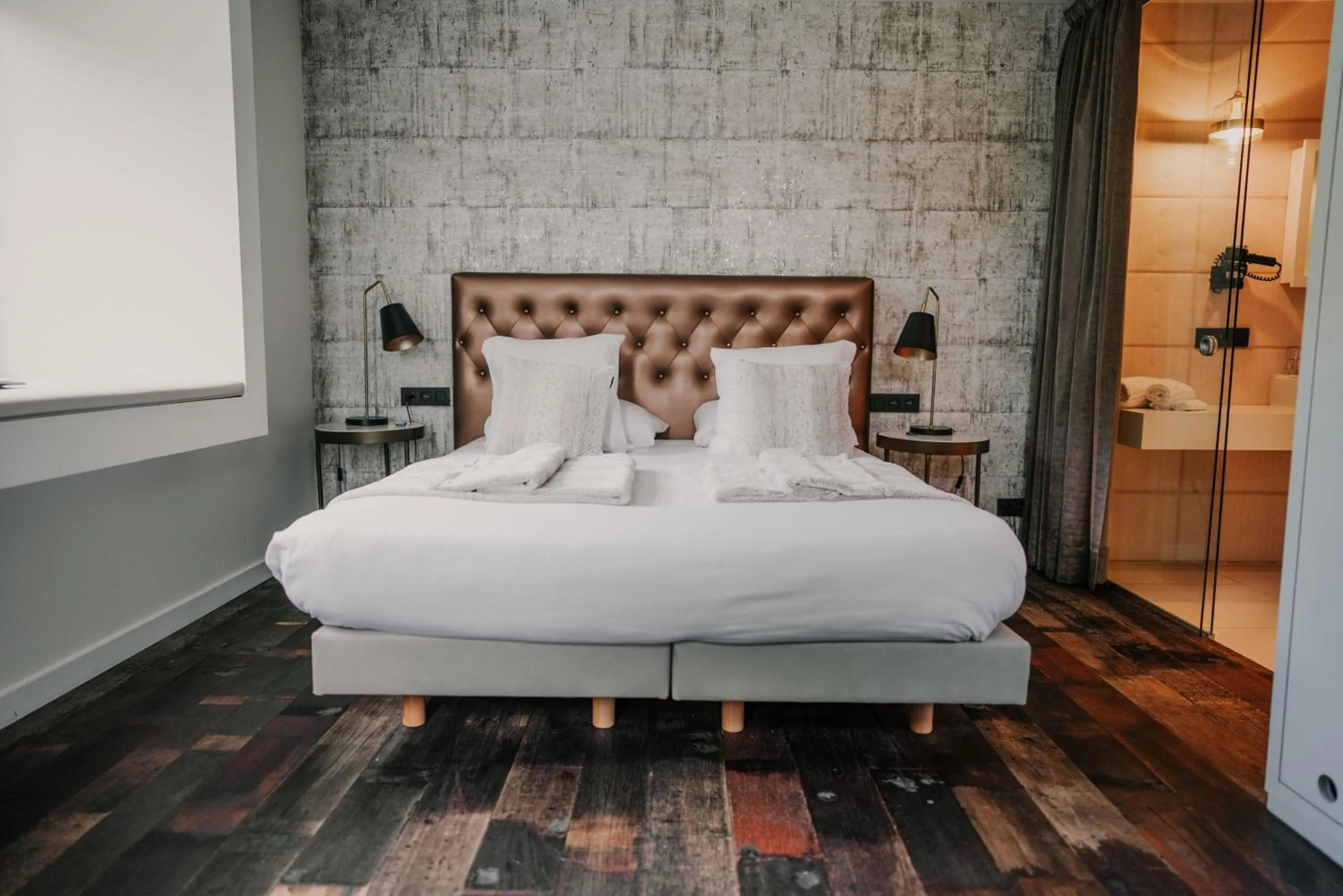 Bed in Hotel Sanglier