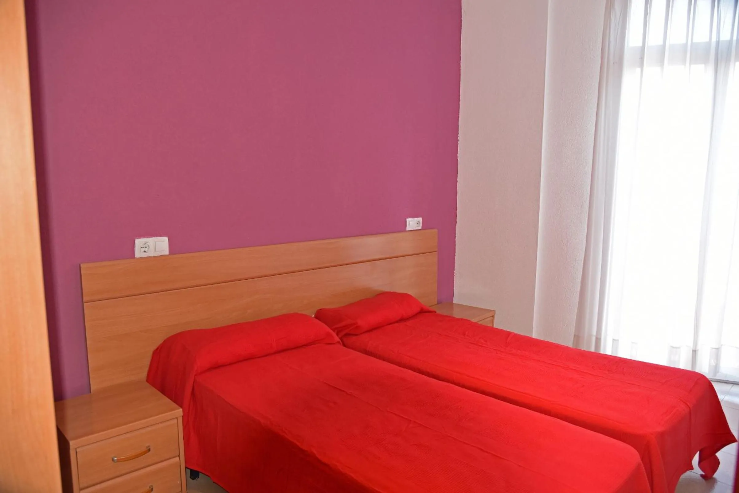 Bedroom, Bed in Apartamentos AR Dosjoimi