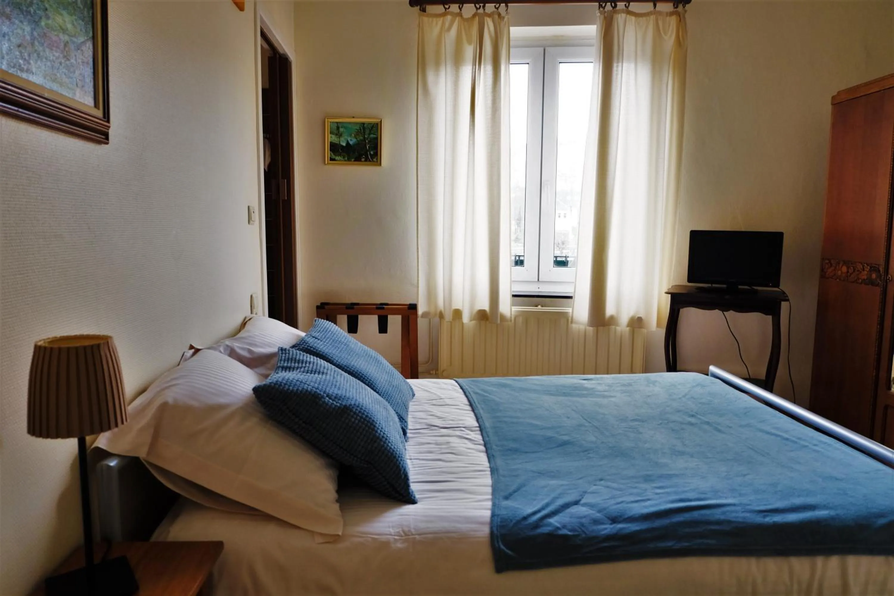 Bed in Hotel Beau Rivage and Restaurant Koulic