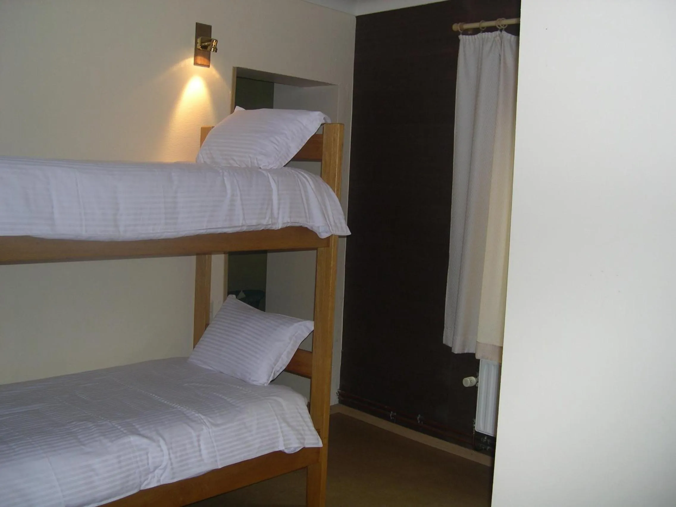 Bed in Hotel Beau Rivage and Restaurant Koulic