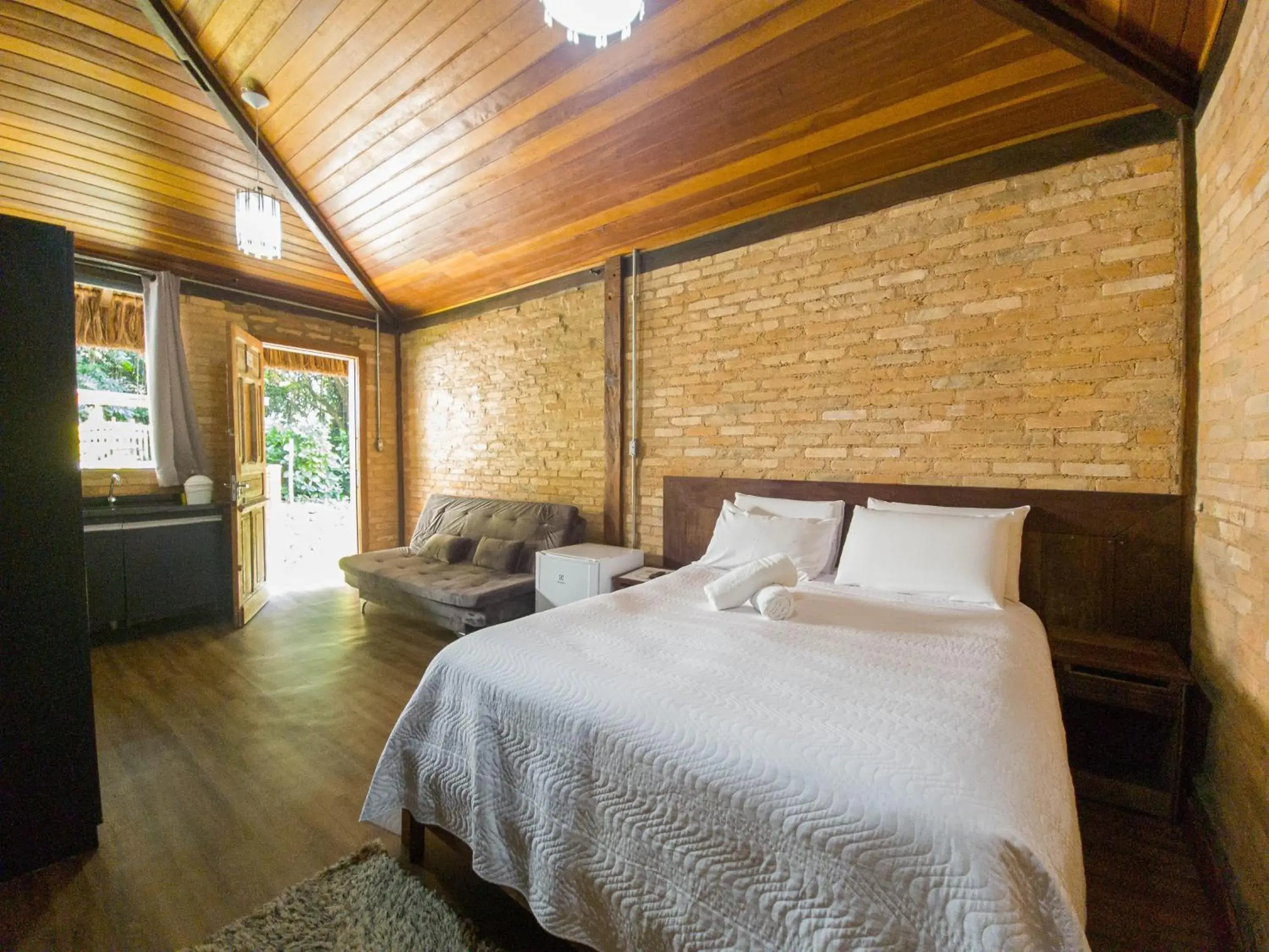 Bed in Yannai Chalé Praia Bed in Yannai Chalé Praia