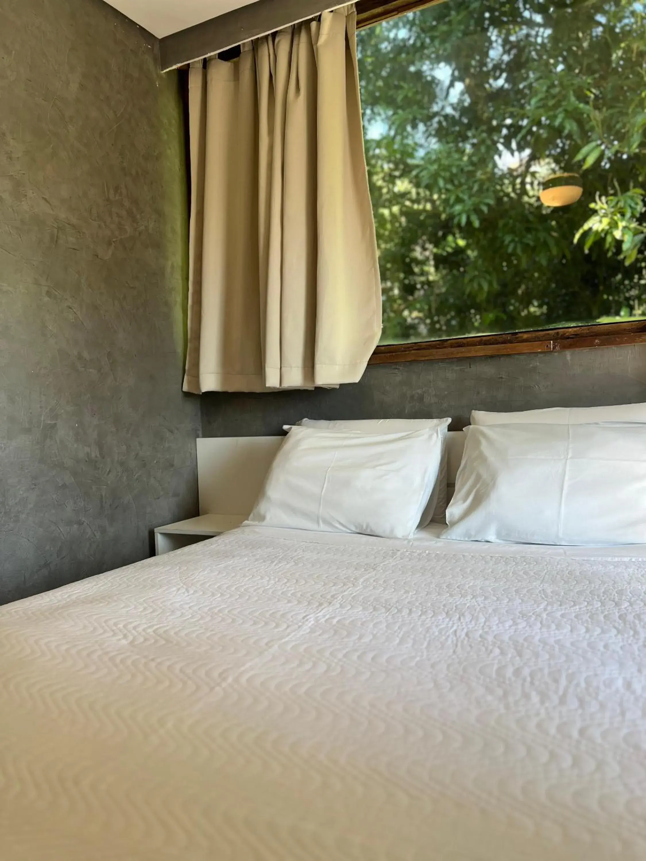 Bed in Yannai Chalé Praia Bed in Yannai Chalé Praia