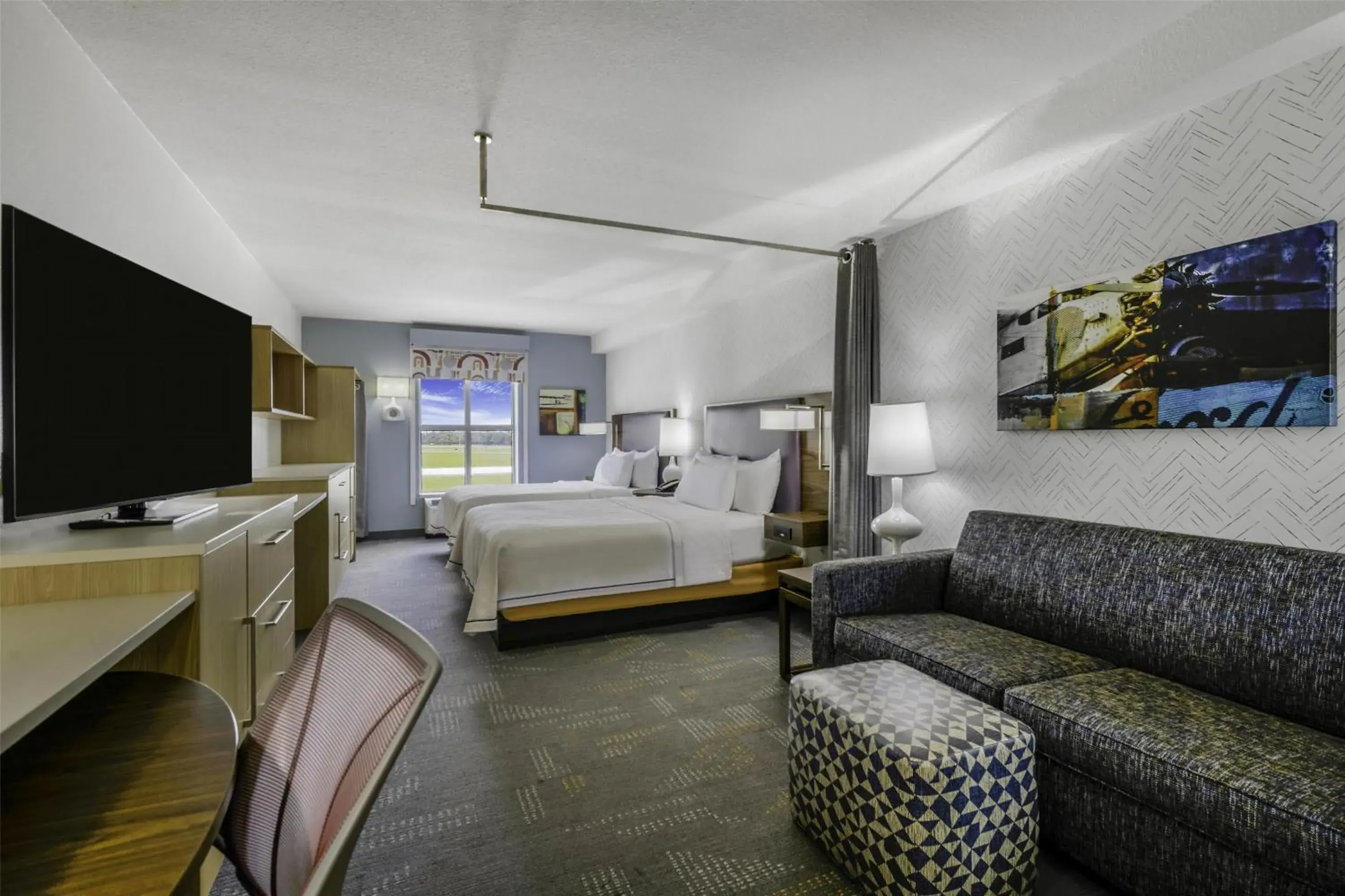 Living room, Bed in Home2 Suites By Hilton St. Simons Island Living room, Bed in Home2 Suites By Hilton St. Simons Island