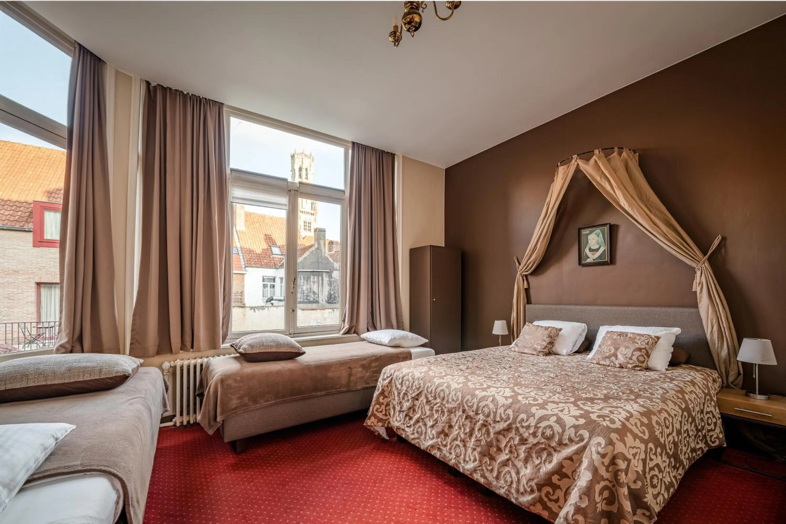 Bed in Hotel Van Eyck