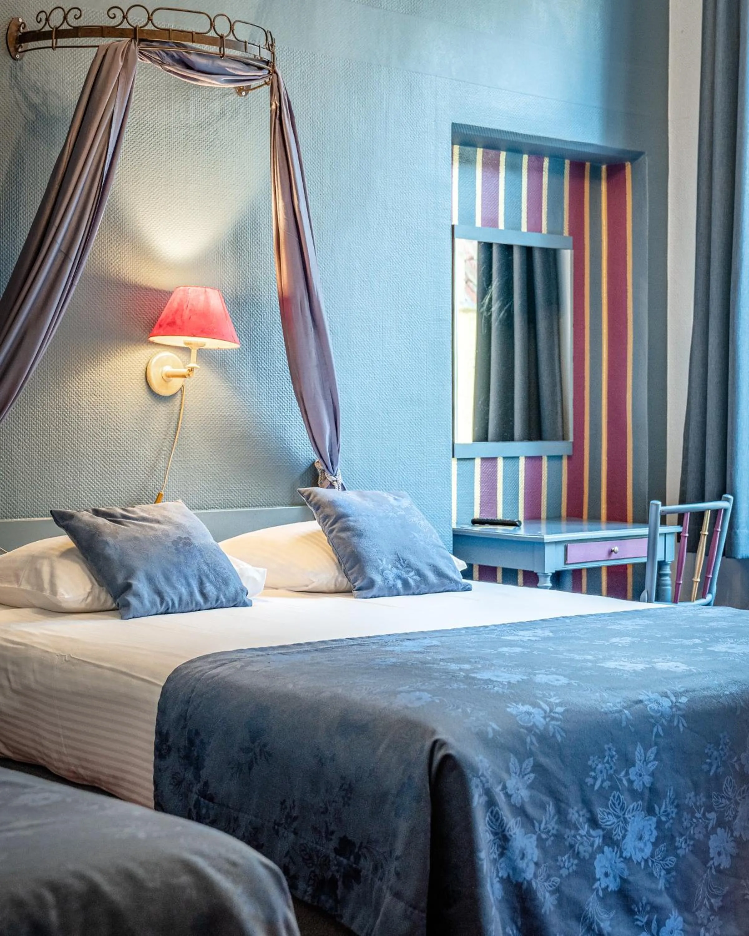 Bed in Hotel Van Eyck