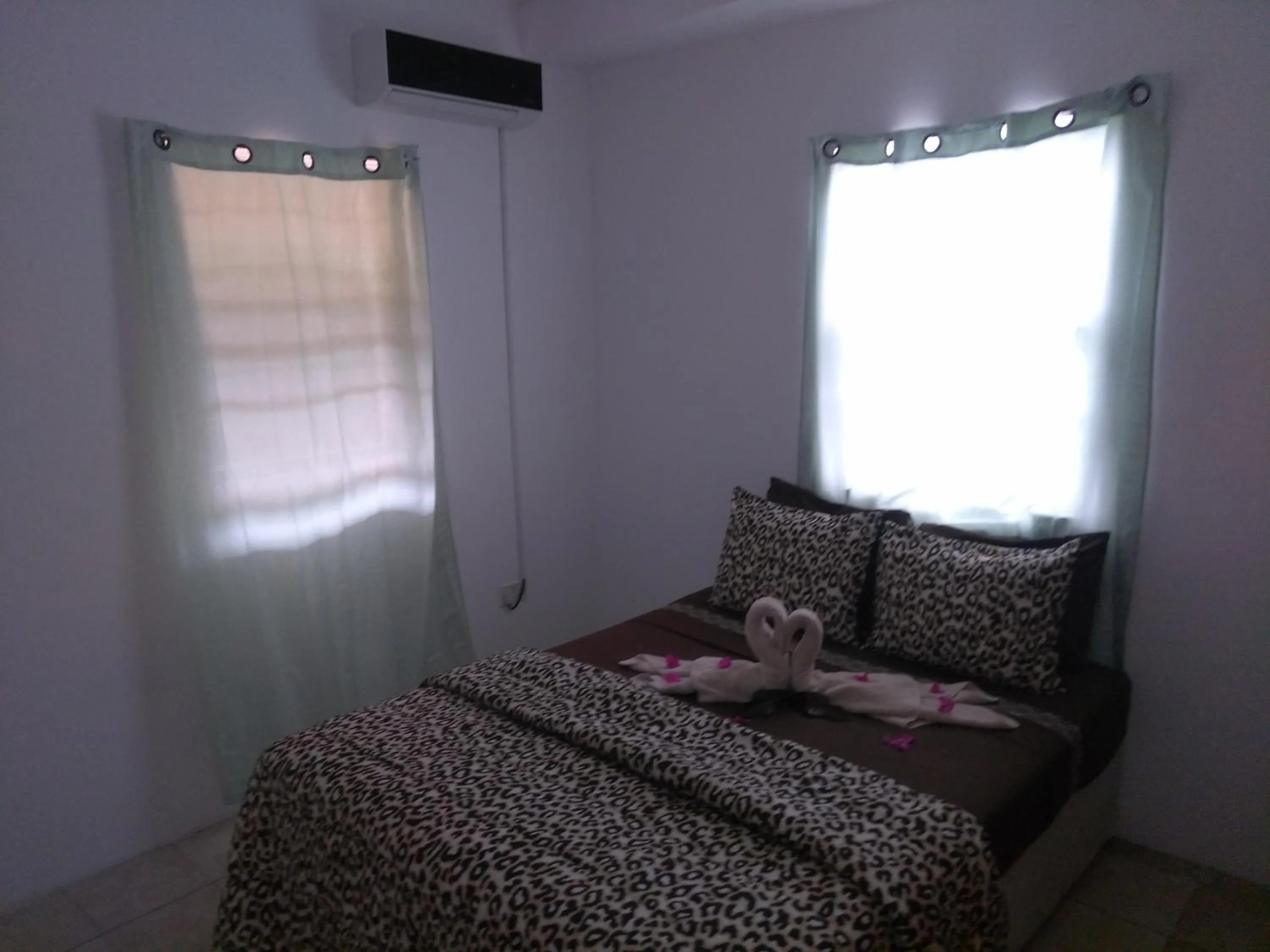 Bed in Caribbean Dream Vacation Property CD1