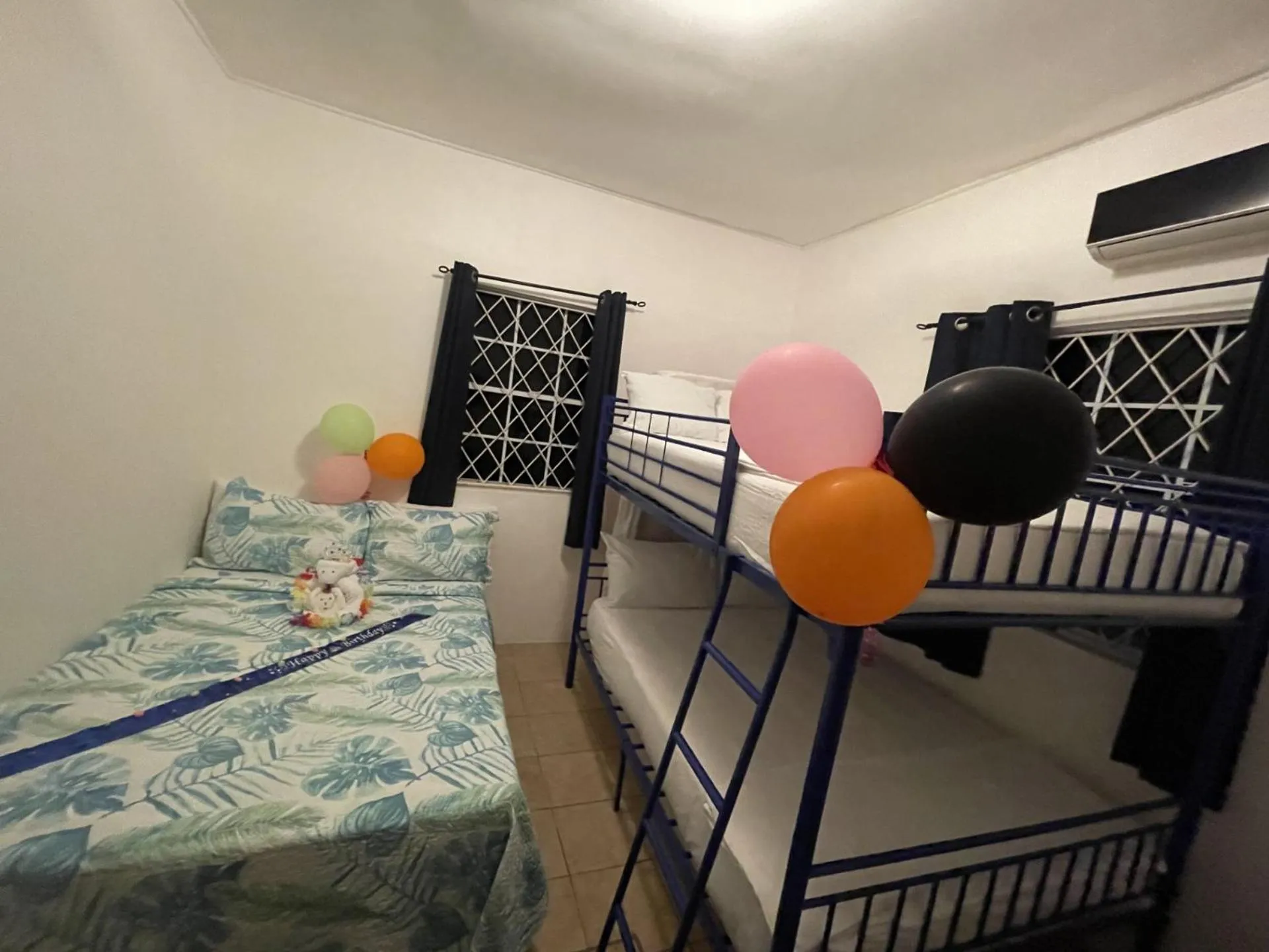 Bed in Caribbean Dream Vacation Property CD1